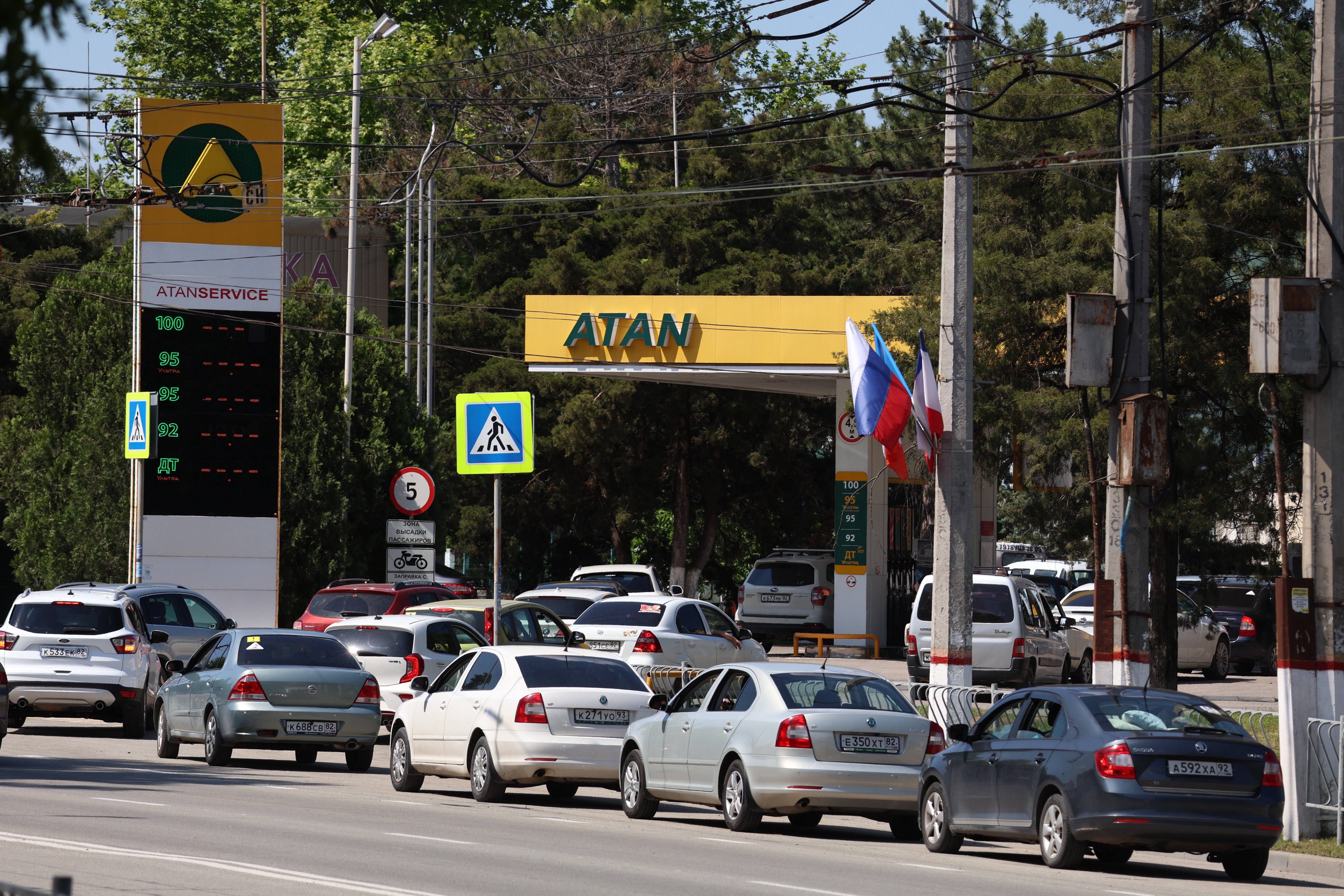 Cars line up at a petrol station in Simferopol, Crimea, Friday