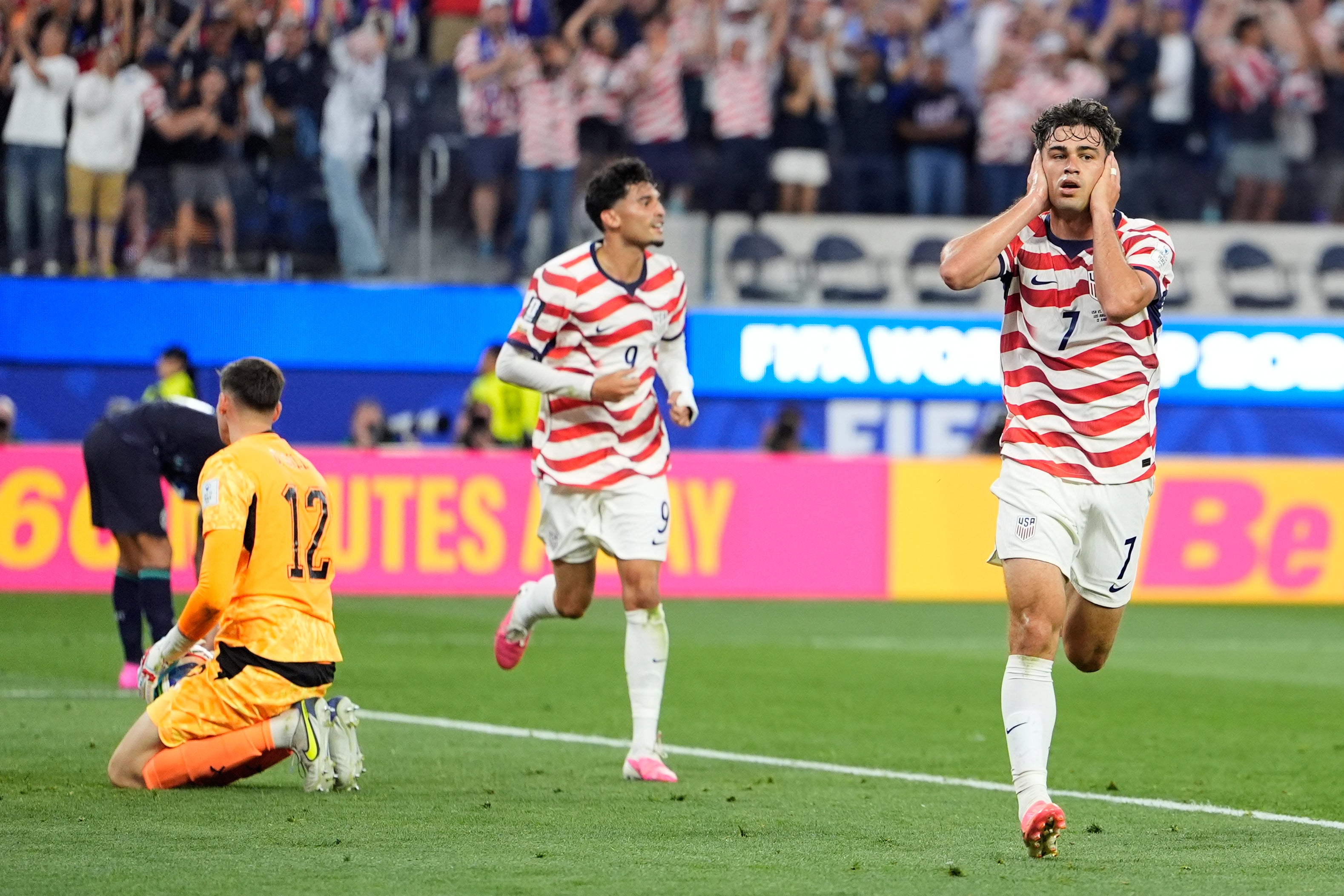 United States' Giovanni Reyna, right, reacts after scoring his team's fourth goal during the World Cup Group D soccer match between the United States and Paraguay in Inglewood, Calif., near Los Angeles, Friday, June 12, 2026. (AP Photo/Mark J. Terrill)