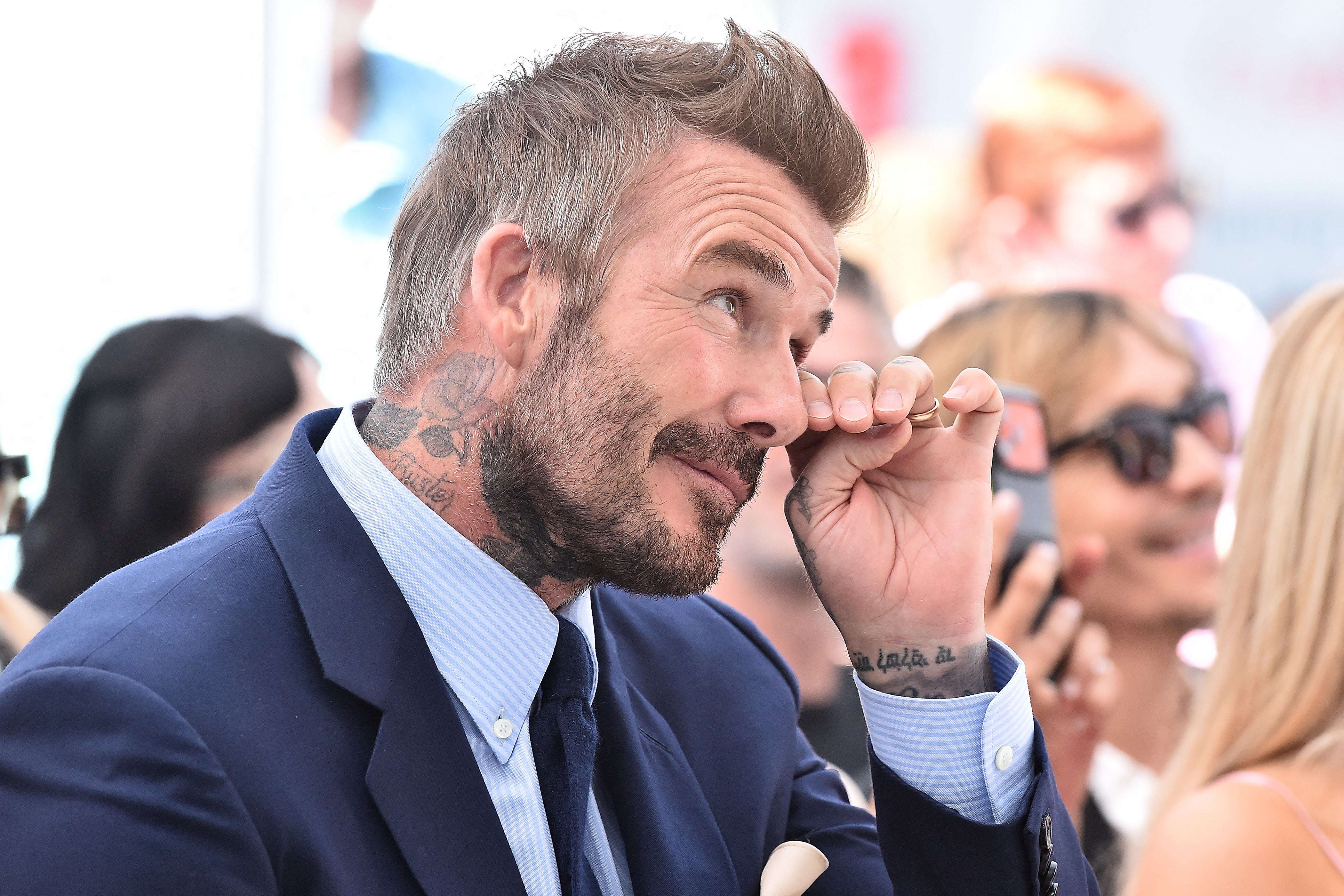 Sir David Beckham was banned from driving for six months for using his mobile phone at the wheel in 2019 (AFP/Getty)