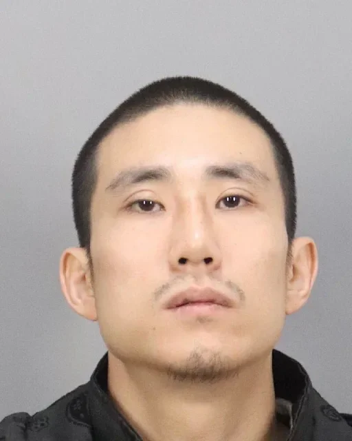 Myung Jin Kim, 31, became the first known wanted fugitive transferred from Laos to the U.S. after allegedly committing two murders in California and spending nearly eight years on the run