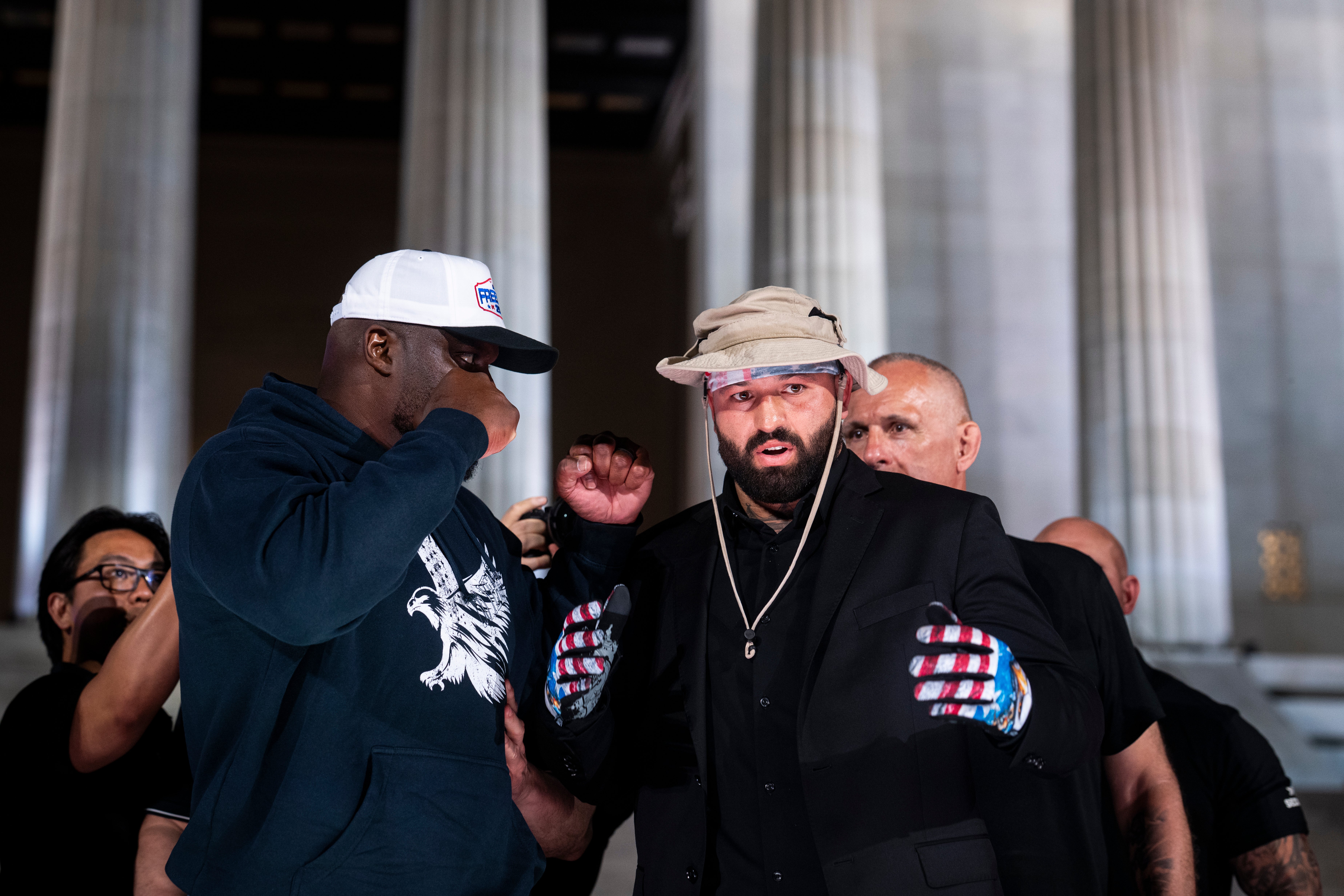 Derrick Lewis facing off with Hokit at Friday’s press conference