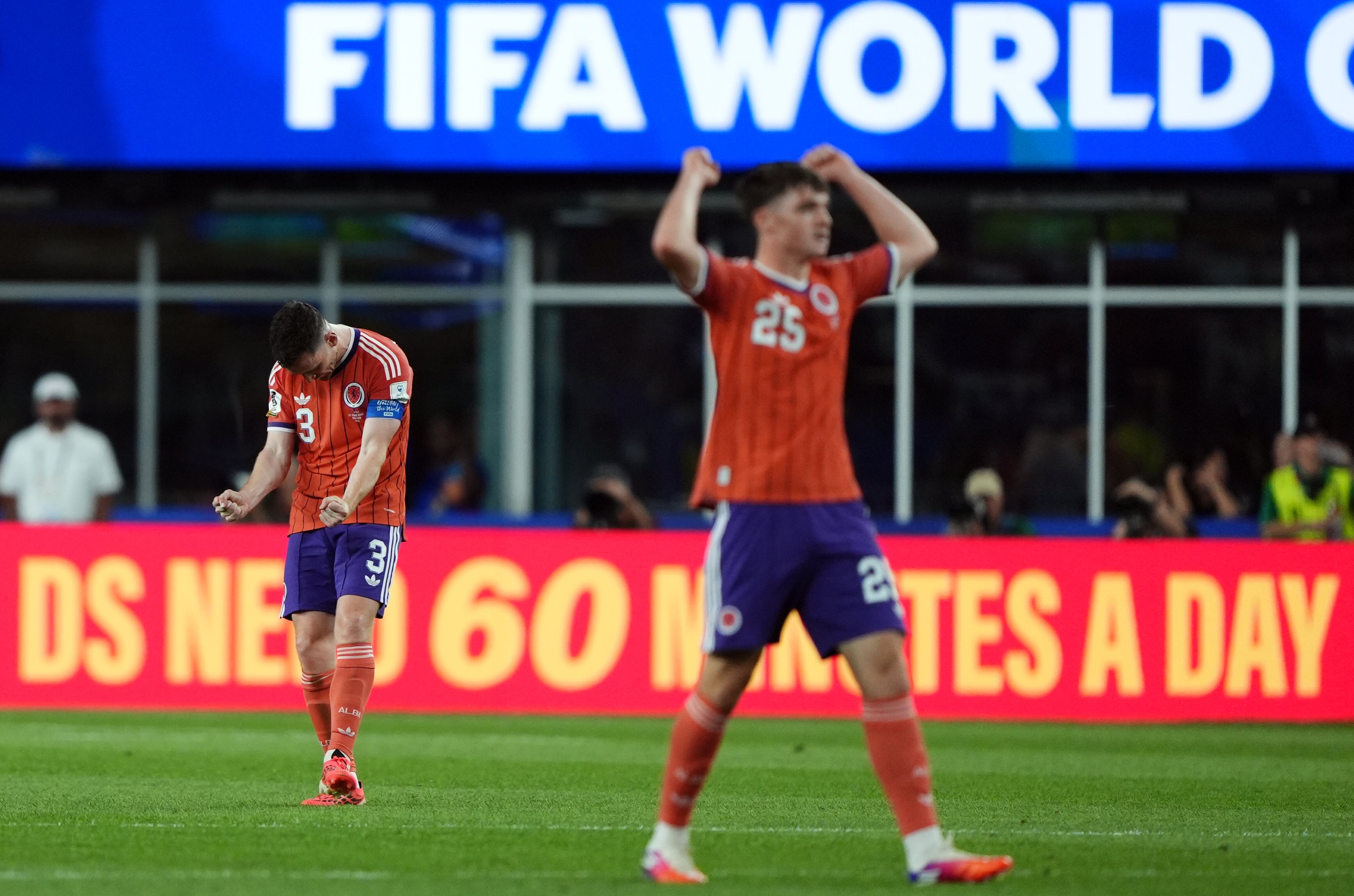 Scotland's Andy Robertson and Findlay Curtis celebrate