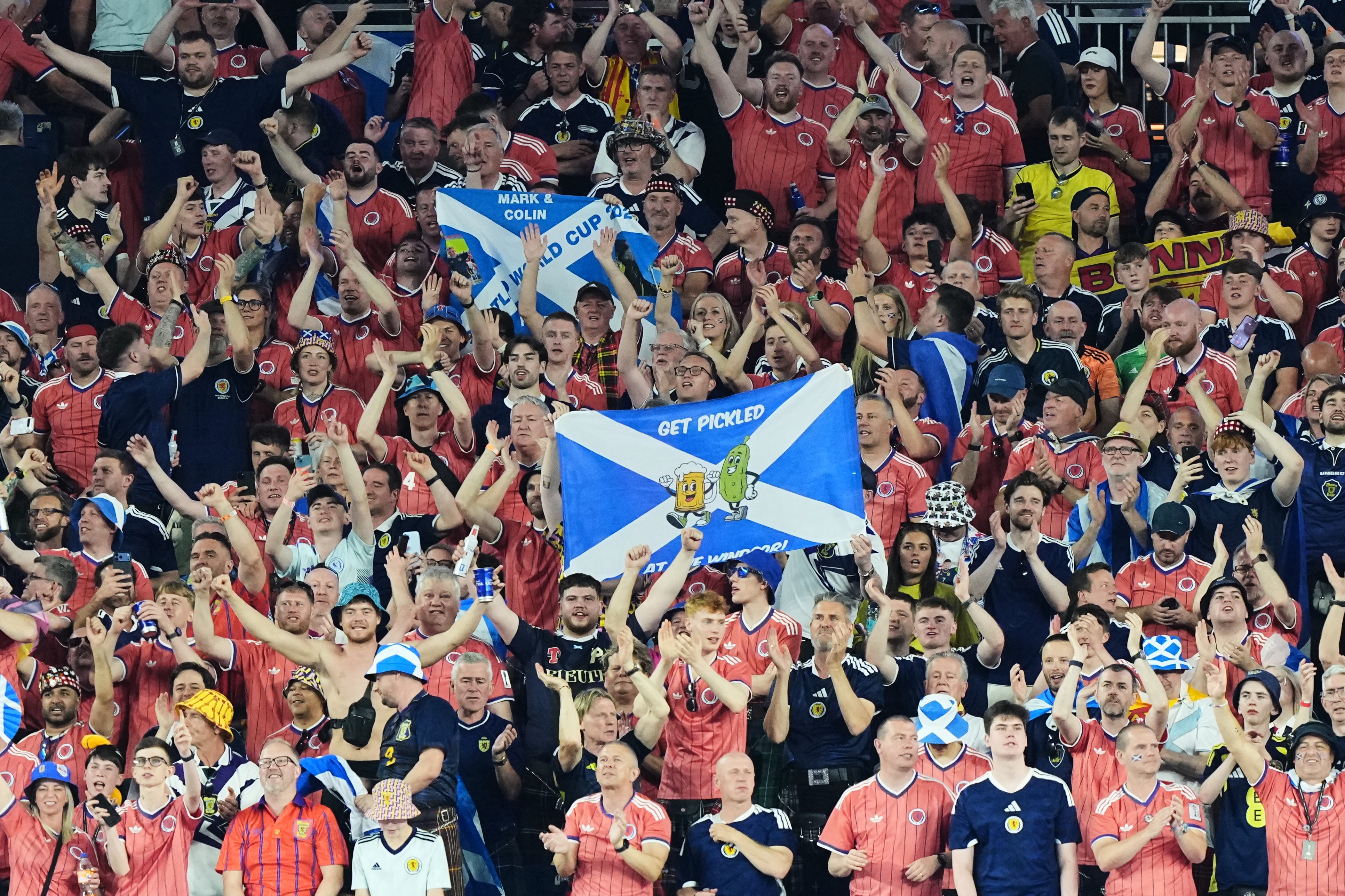 Scotland fans react following their World Cup Group C win