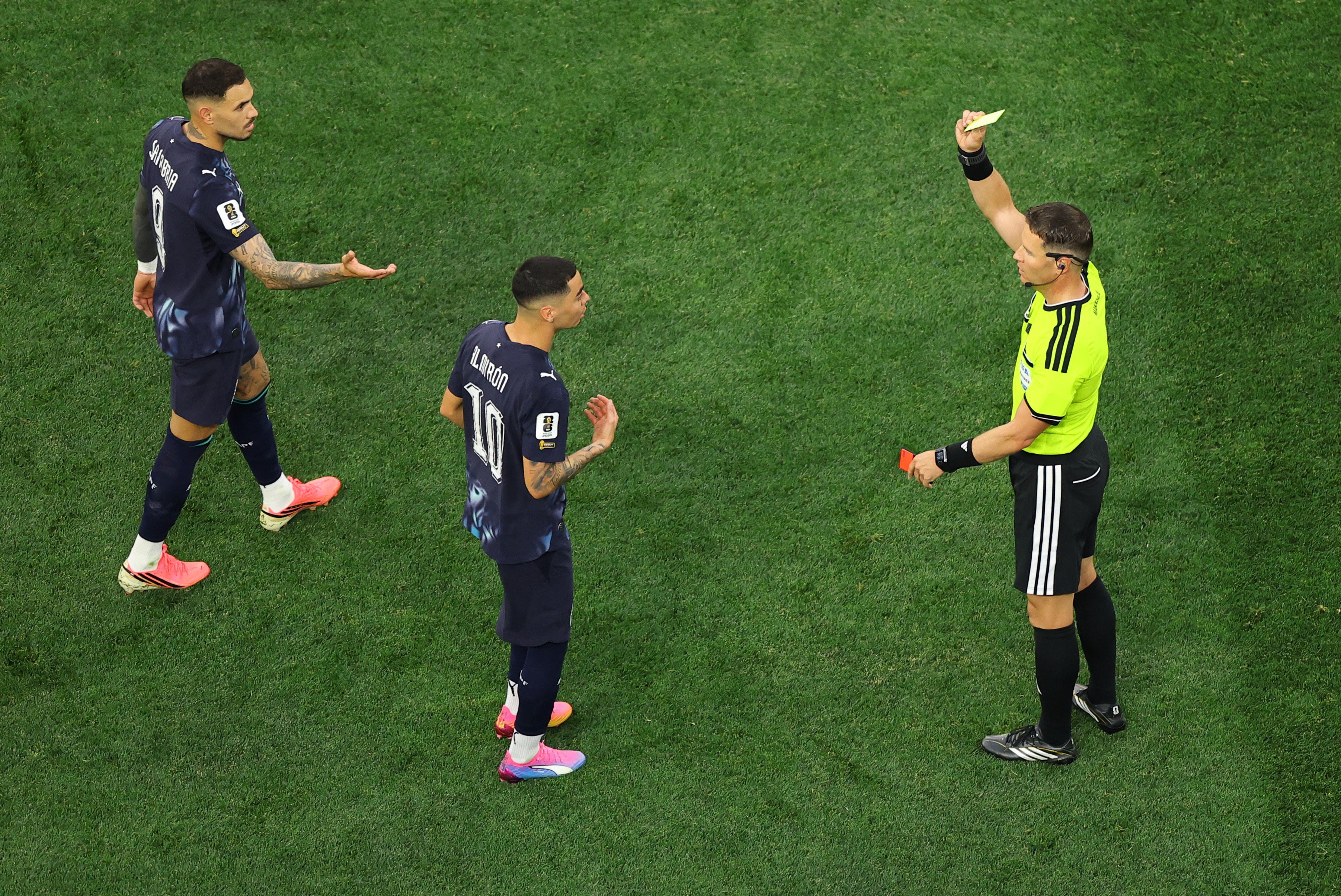 Almiron is shown a yellow card for simulation
