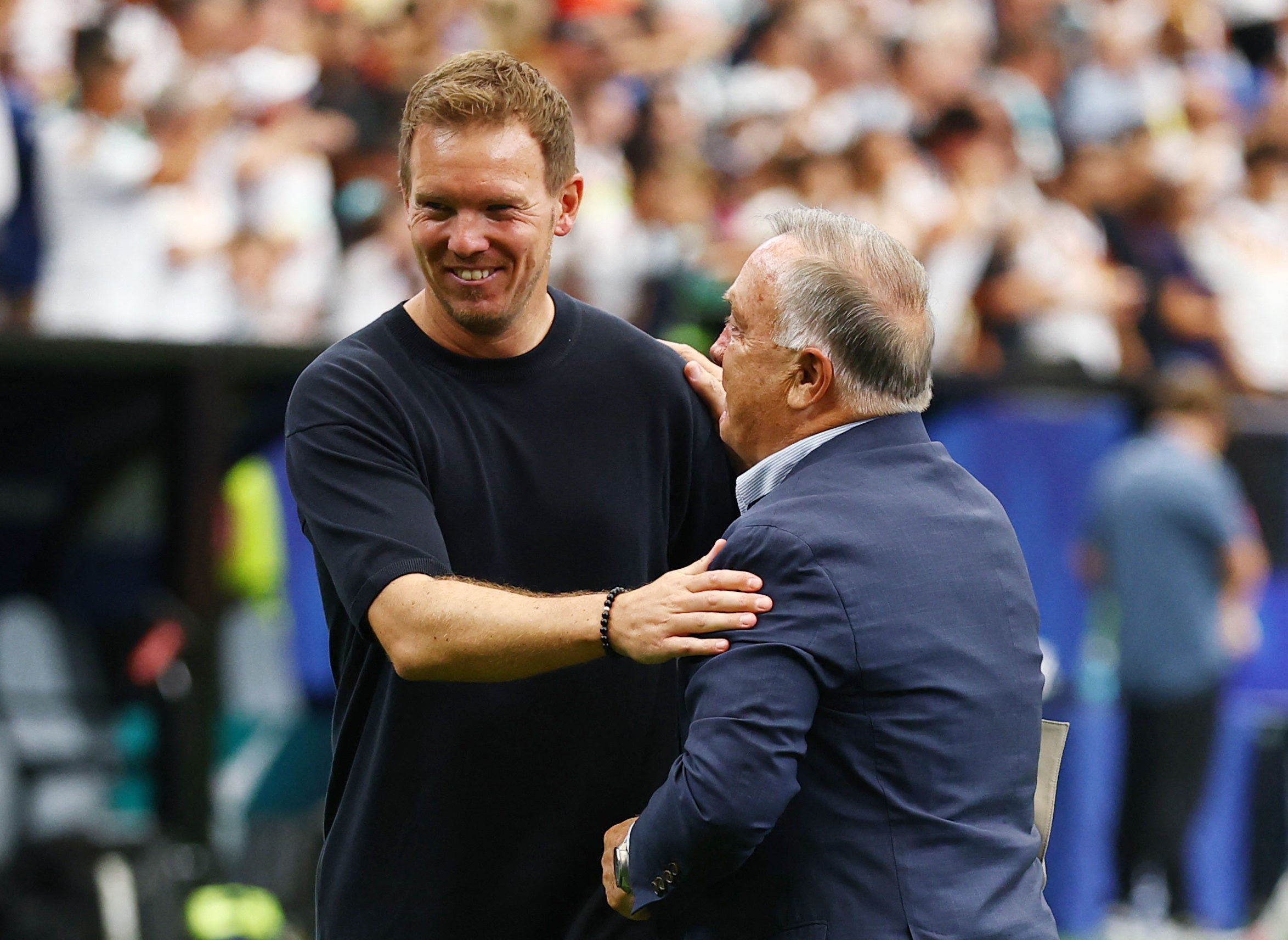 Julian Nagelsmann is congratulated by Curacao coach Dick Advocaat (Reuters)