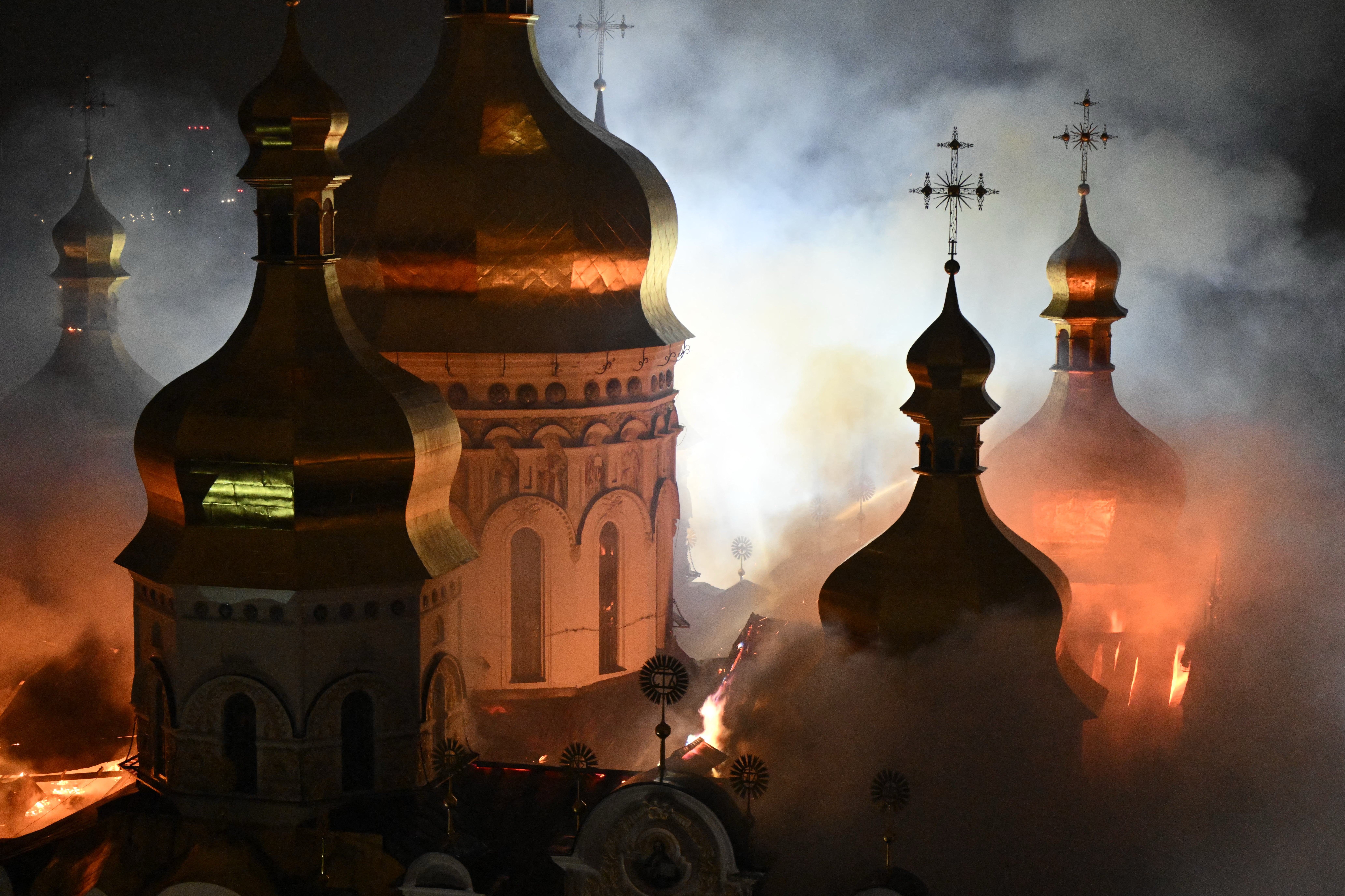 Smoke and fire rises from the Dormition Cathedral in the Orthodox complex of the Kyiv Pechersk Lavra following a Russian missile strike on the Ukrainian capital Kyiv (AFP/Getty)