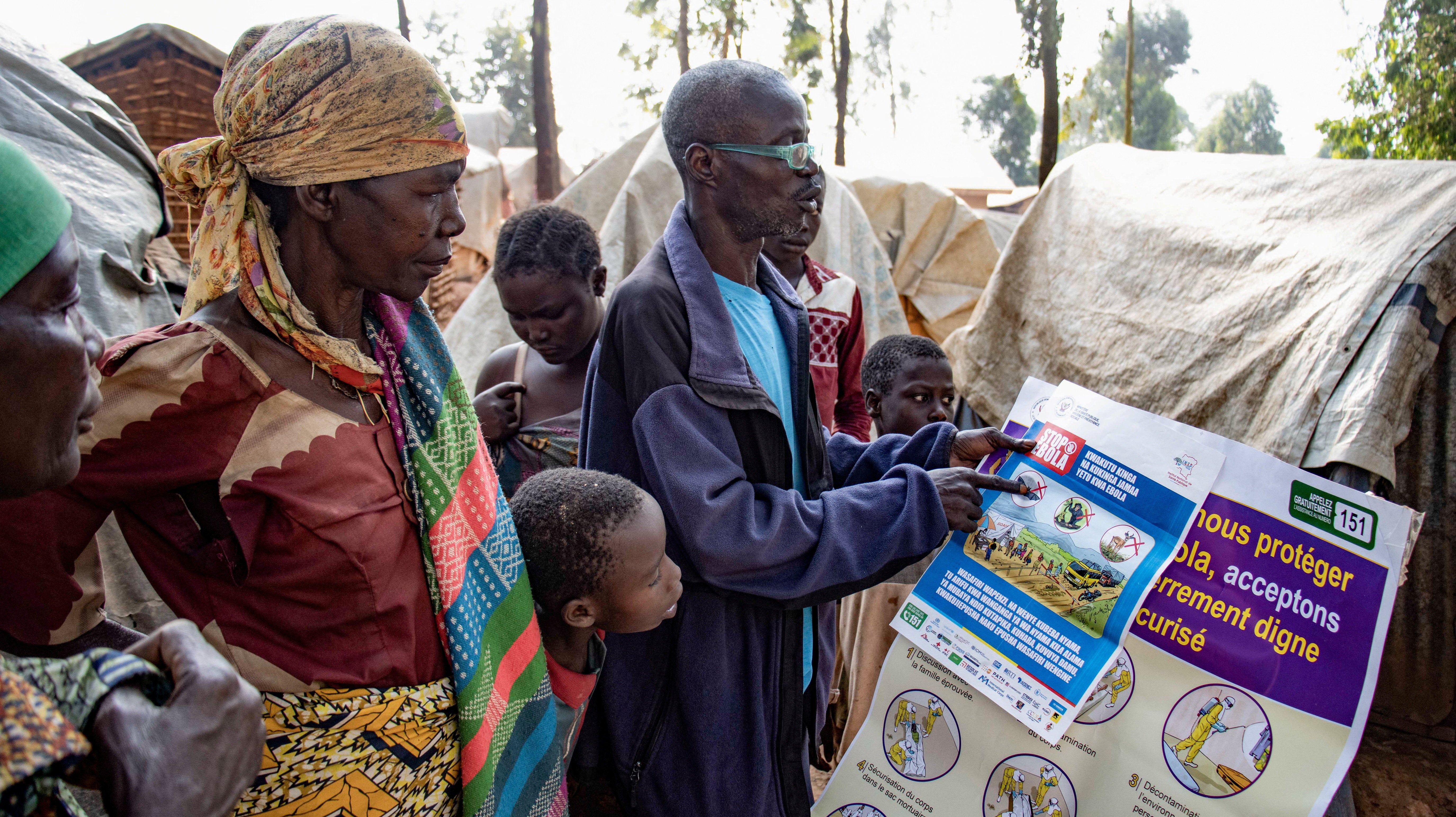 Dz'na Lipe Jean‑Marie, secretary of the displacement camp, speaks during an Ebola awareness session as humanitarian agencies intensify efforts to contain a new Ebola outbreak (Reuters)