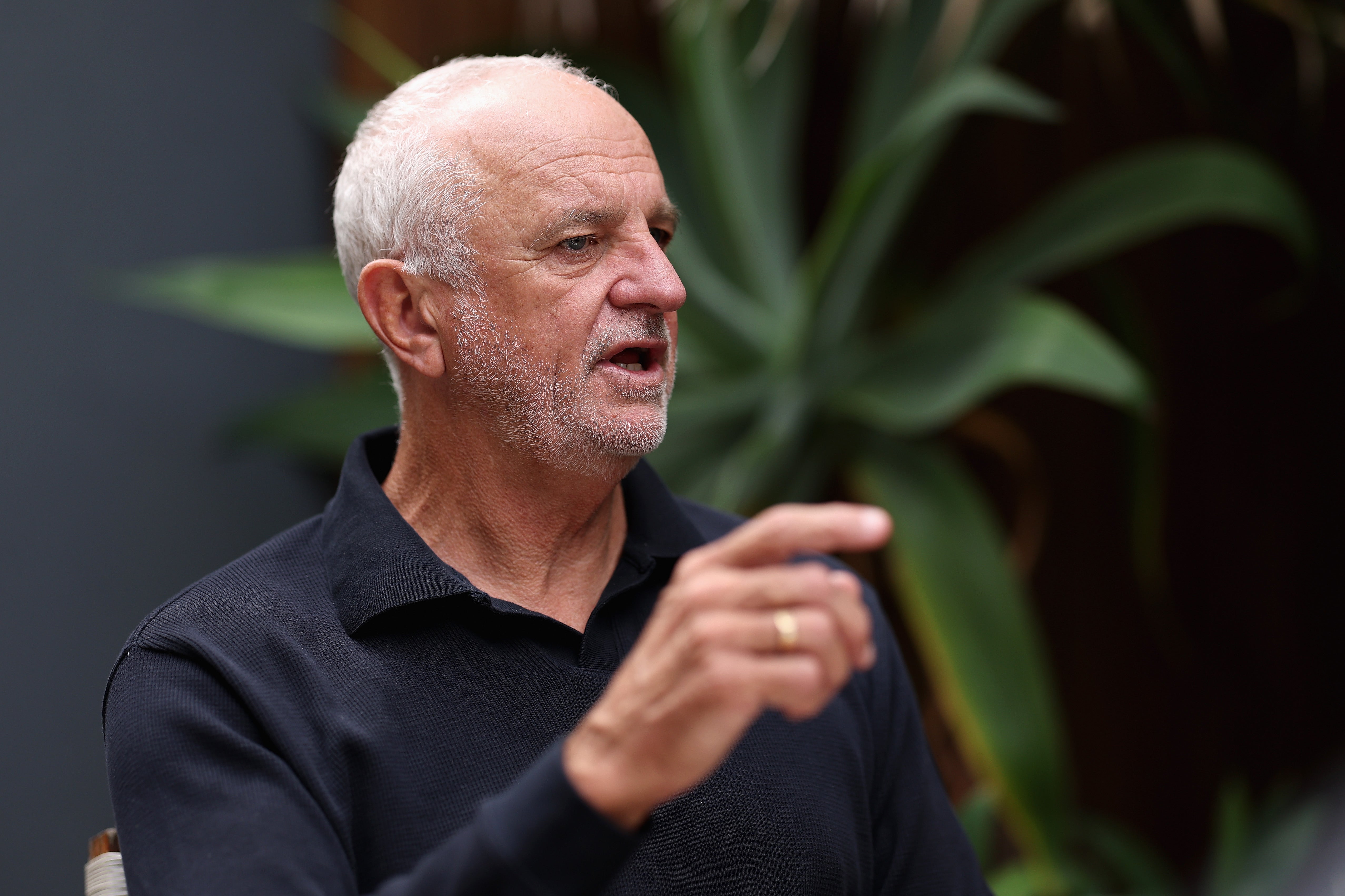 Graham Arnold is the head coach trying to channel the team spirit