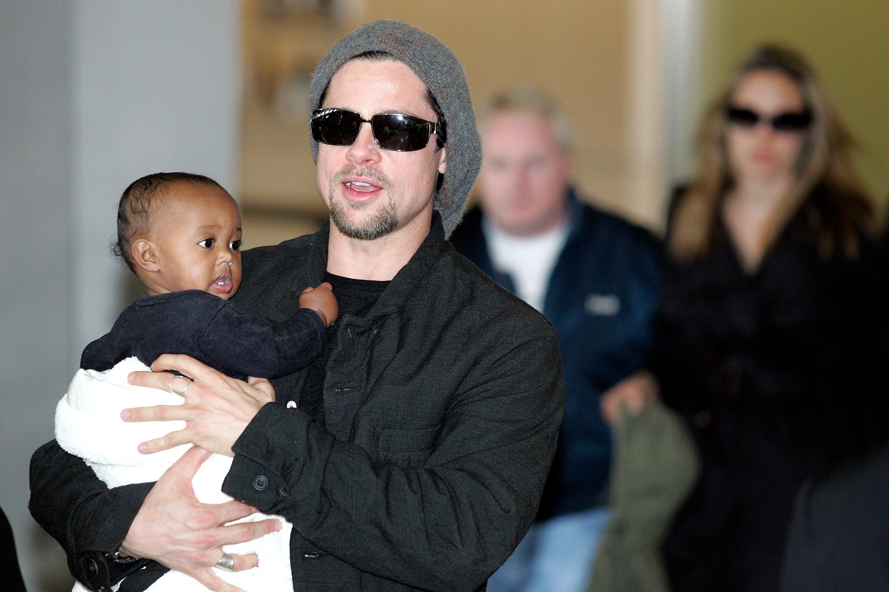 Brad Pitt pictured in 2005 holding his daughter Zahara Marley Jolie, who recently filed to drop ‘Pitt’ from her double-barrelled last name (Getty Images)