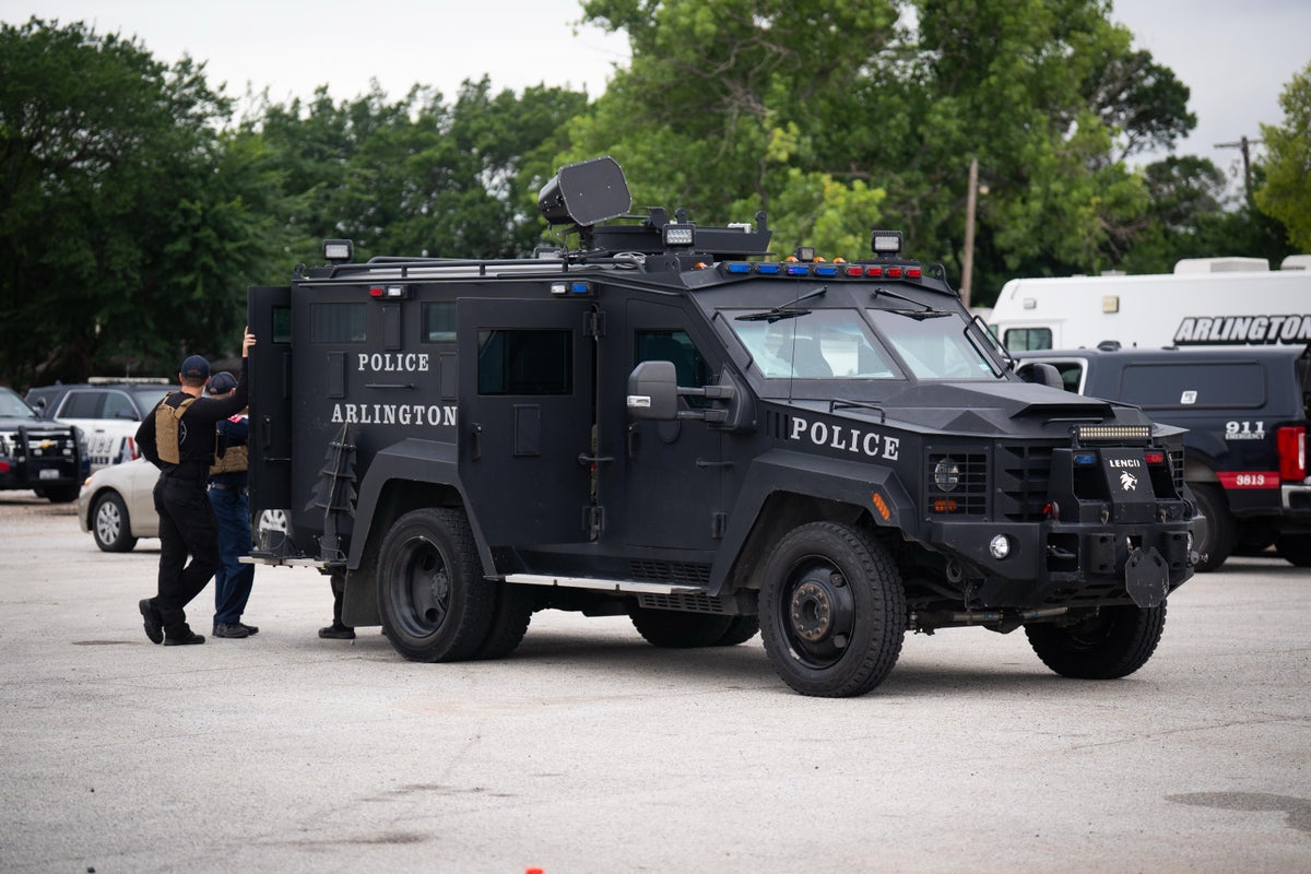 Swat team and armed officers deployed during police incident near England World Cup venue Swat team and armed officers deployed during police incident near England World Cup venue