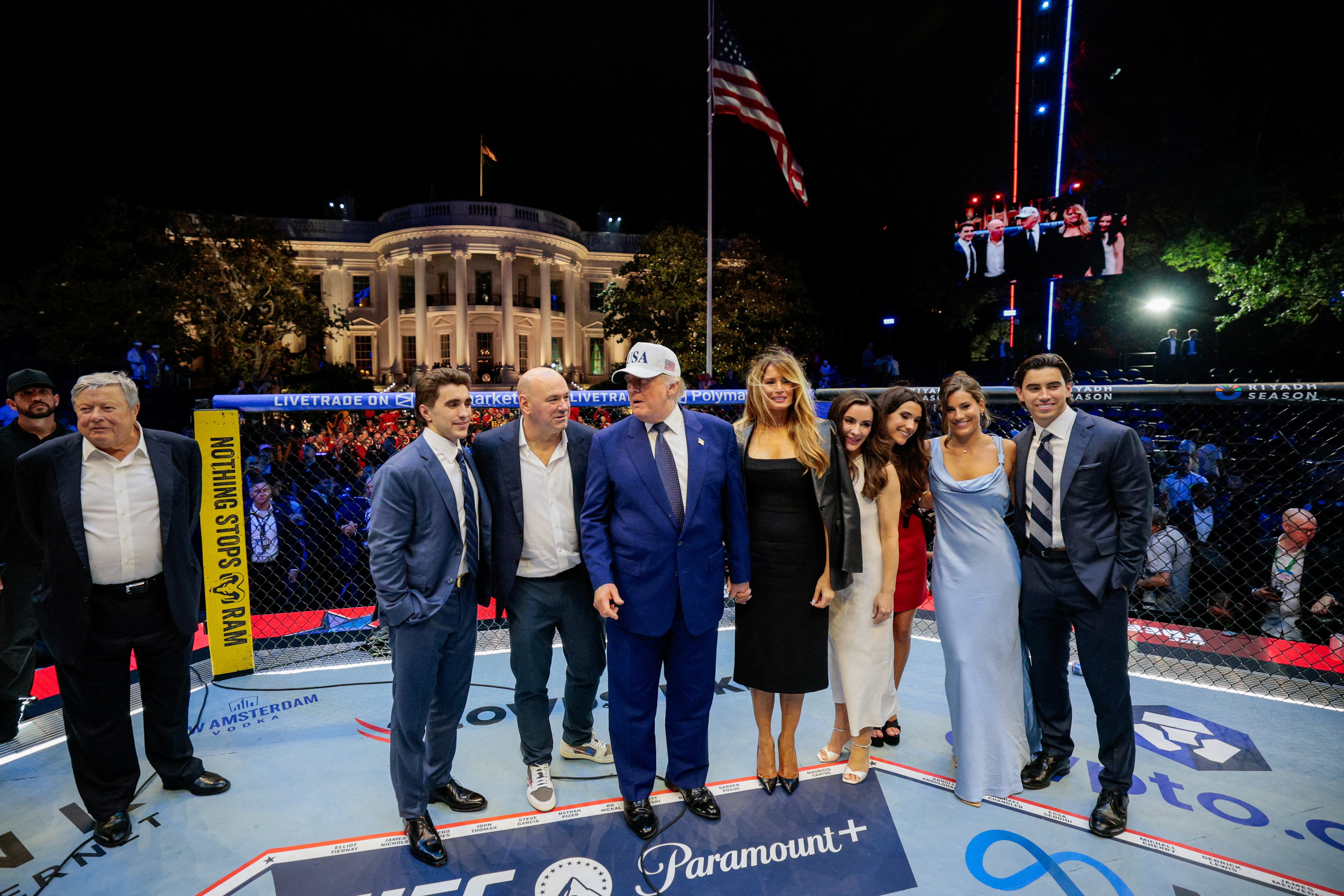 President Donald Trump and first lady Melania Trump stepped into the ring to celebrate the end of UFC Freedom 250, following Justin Gaethje's victory over Ilia Topuria (REUTERS)