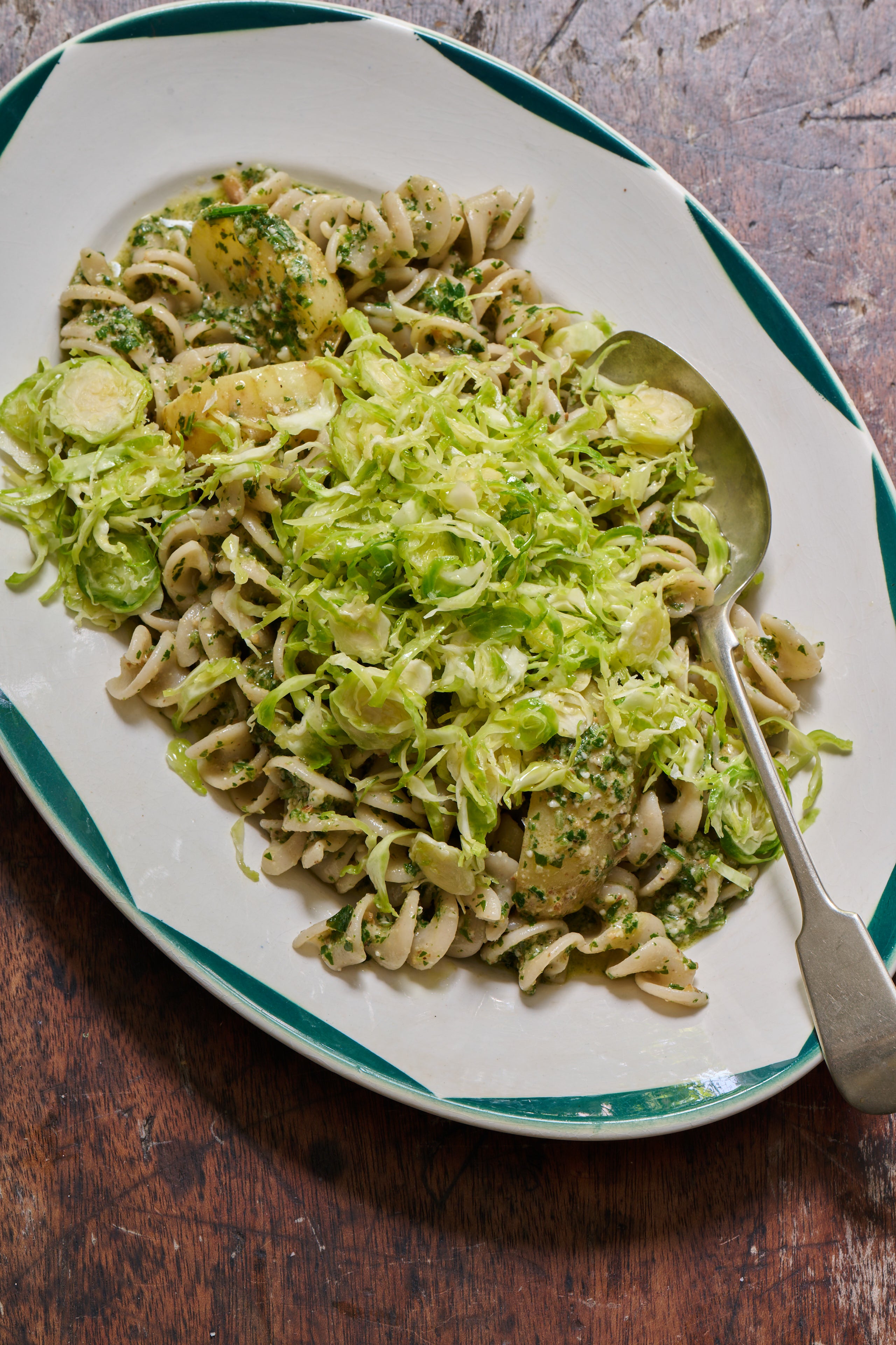 Walnuts and shredded Brussels sprouts give this Ligurian-inspired dish a fresh twist