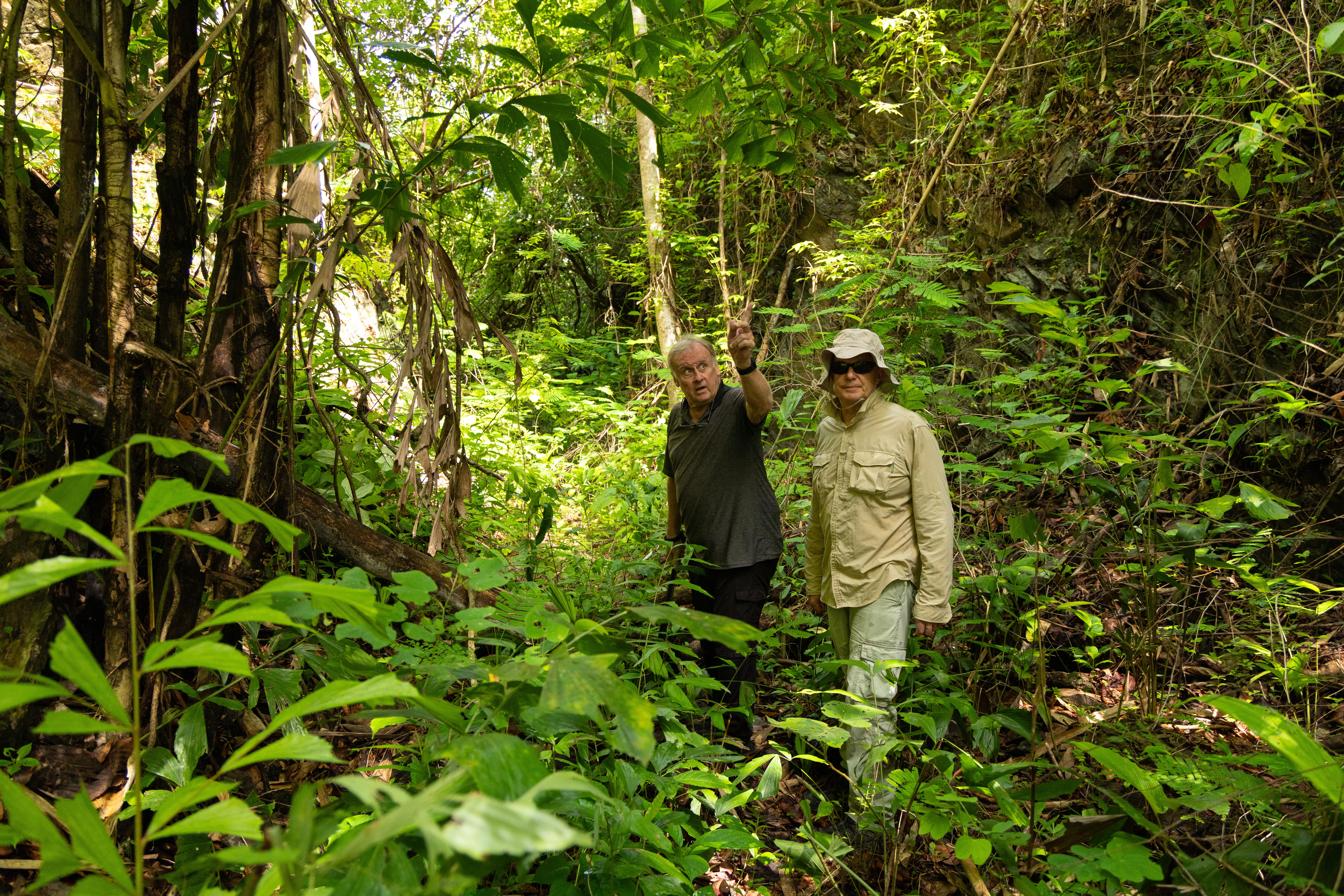 Researchers Andrew Snow, left, and Martyn Fryer trek into a section of the infamous World War II ‘Death Railway’, leading to Nithe Station