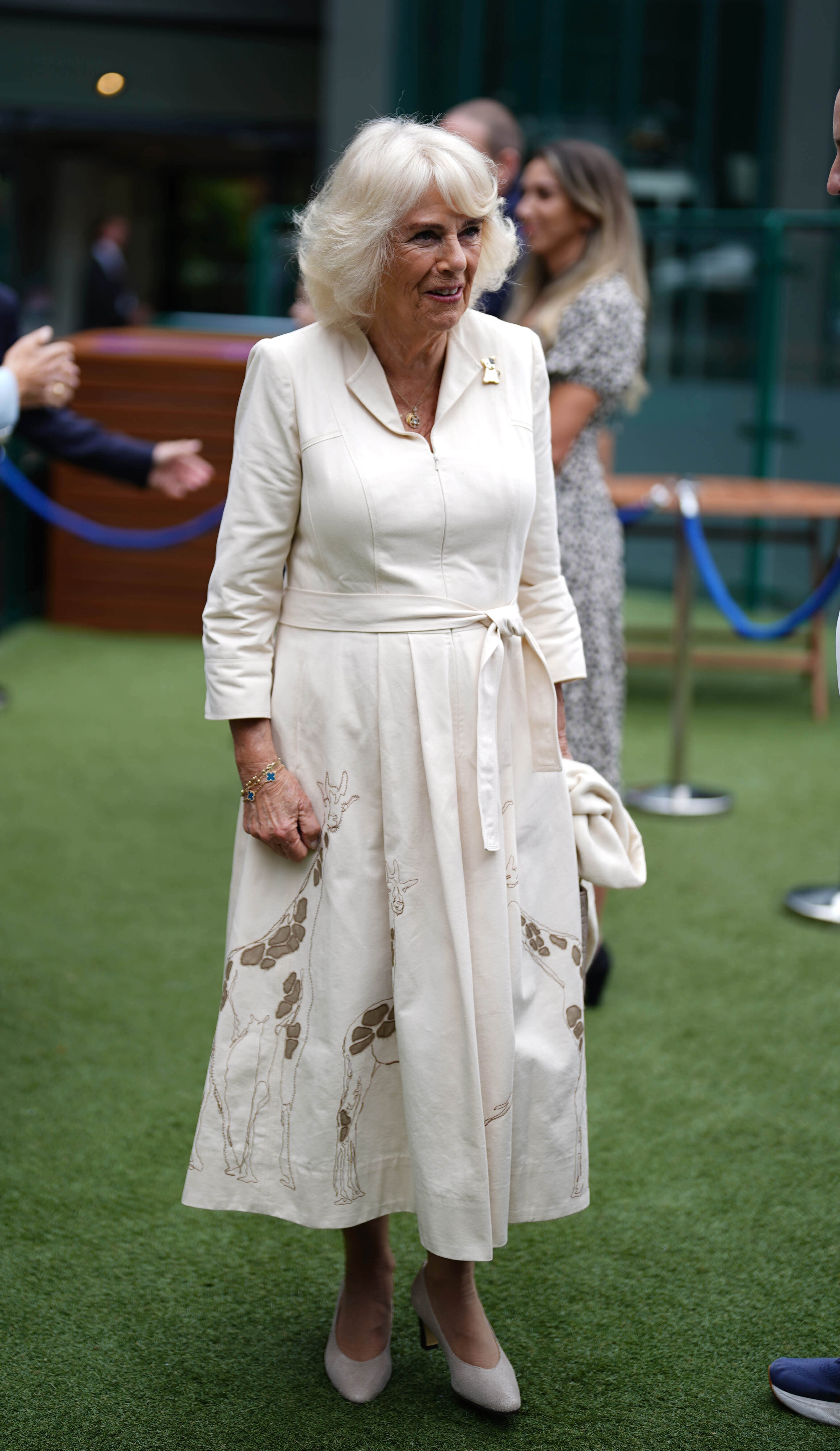 Queen Camilla wore all white for Wimbledon (Jordan Pettitt/PA)