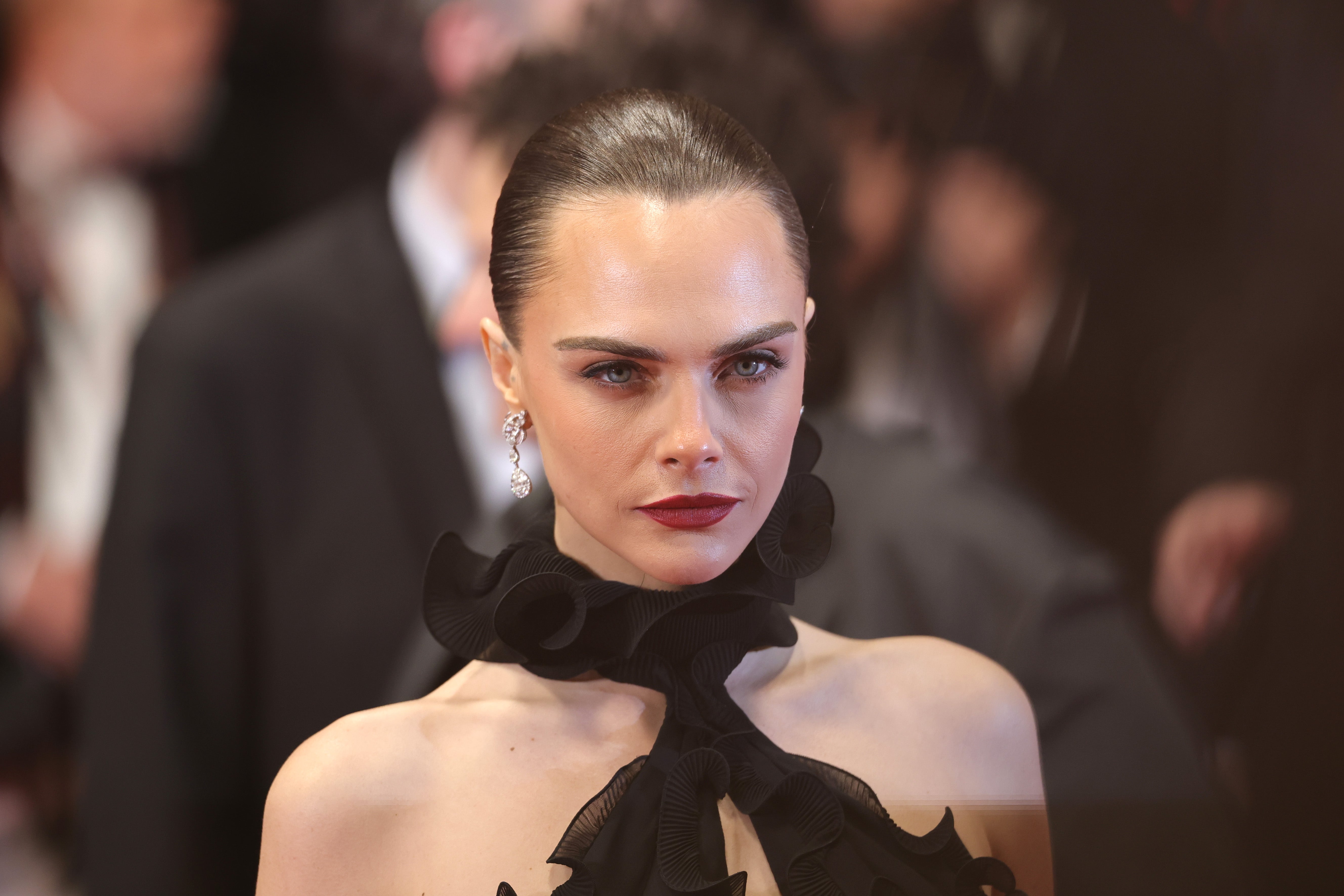 Cara Delevingne has spoken about how being hurt by one man changed her approach to dating moving forward (Getty)