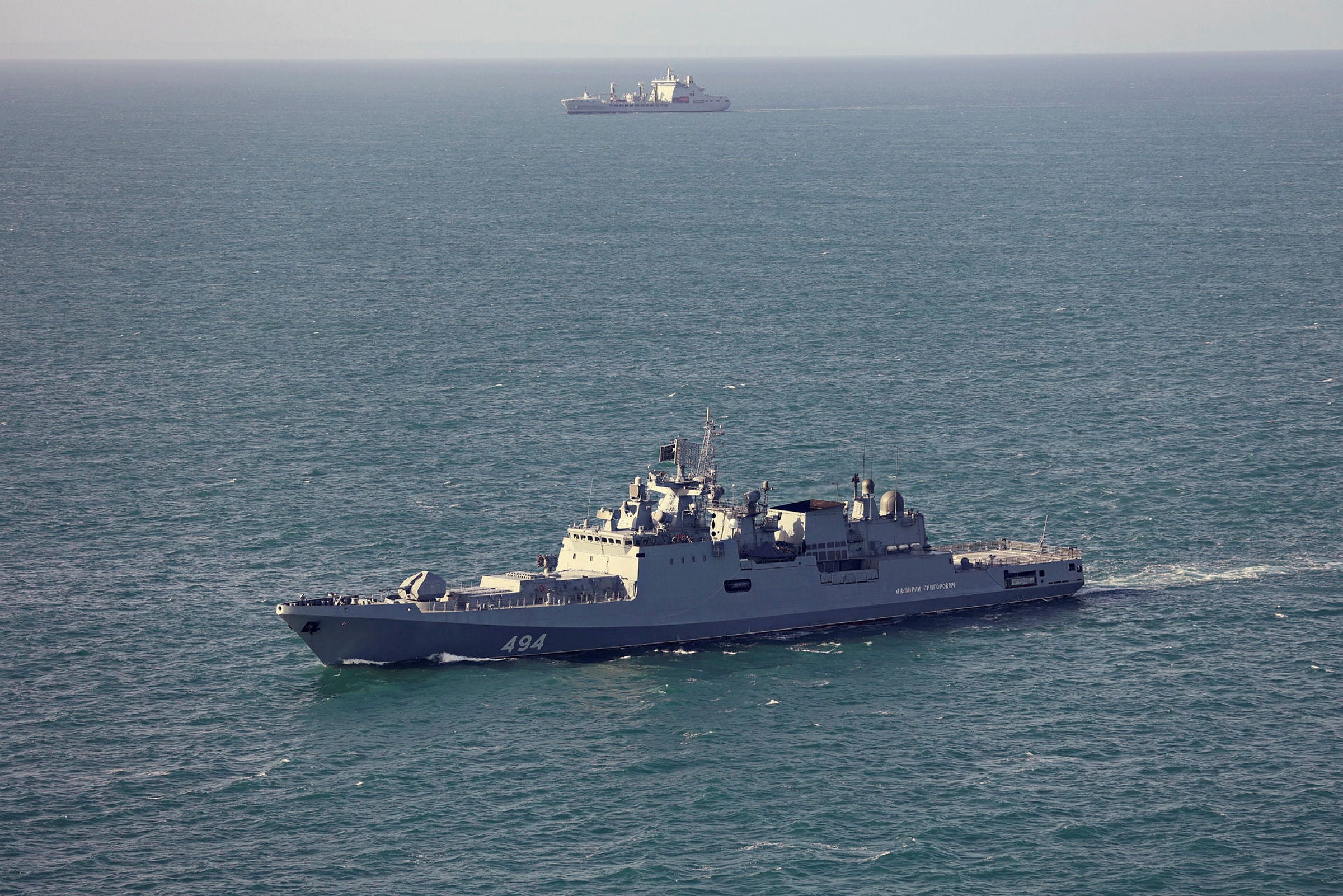 In this undated handout image provided by the UK Ministry of Defence, the Russian frigate Admiral Grigorovich (foreground) is monitored by the Royal Navy's RFA Tideforce