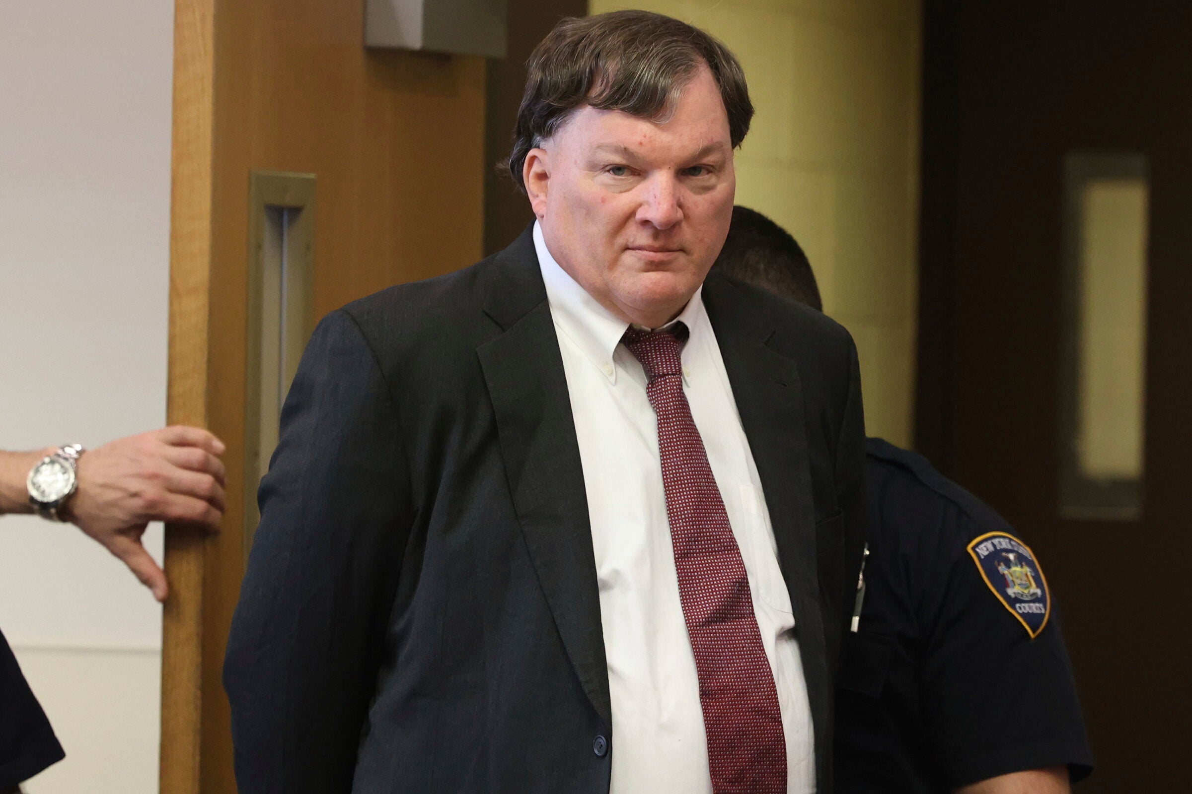 Rex Heuermann appears in Judge Timothy Mazzei's courtroom at Suffolk County Court in Riverhead, N.Y., for a status conference on Feb. 25
