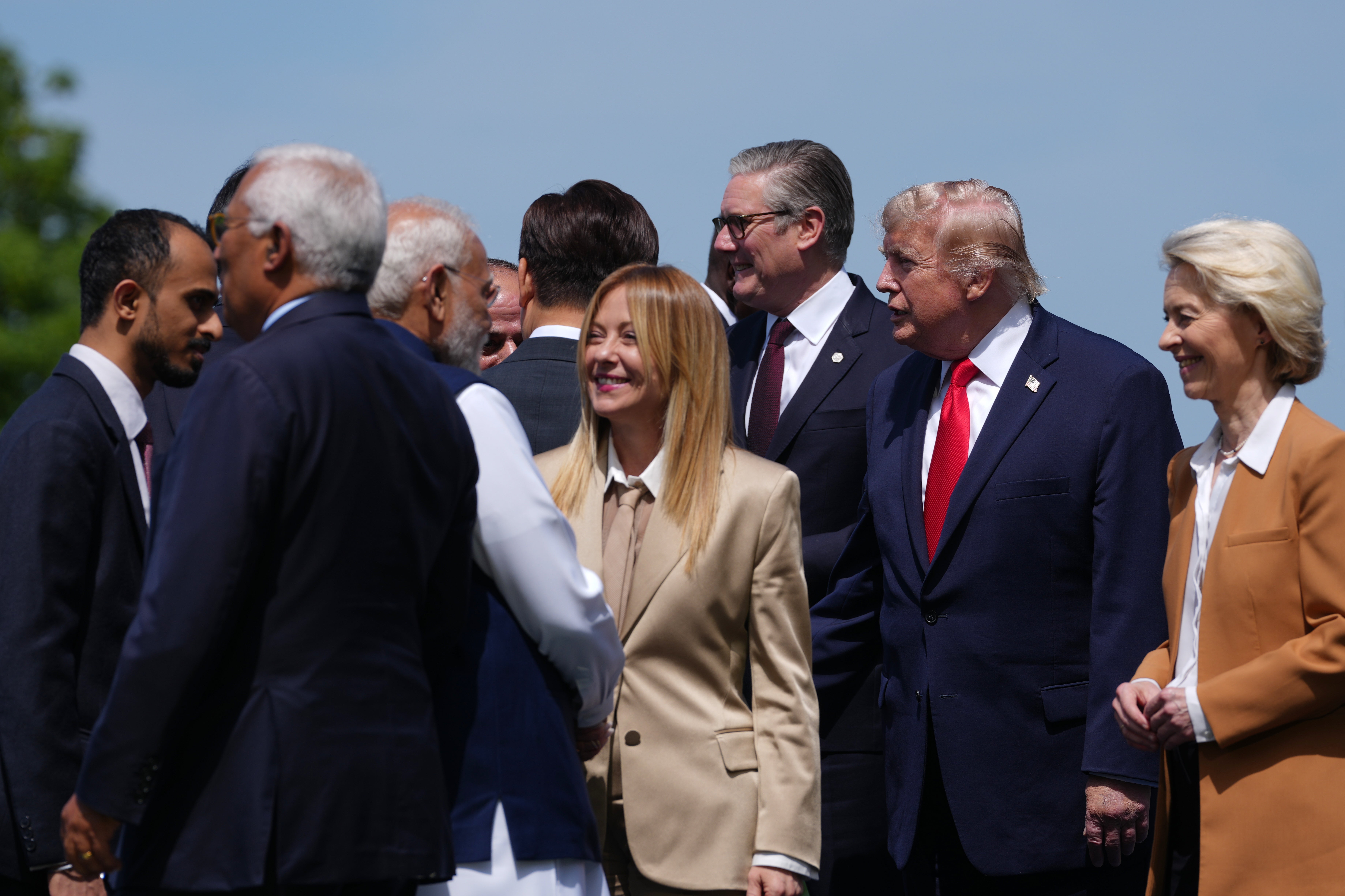 Narenda Modi and Giorgia Meloni exchange greetings during a group photo at the G7 summit in France (AP)