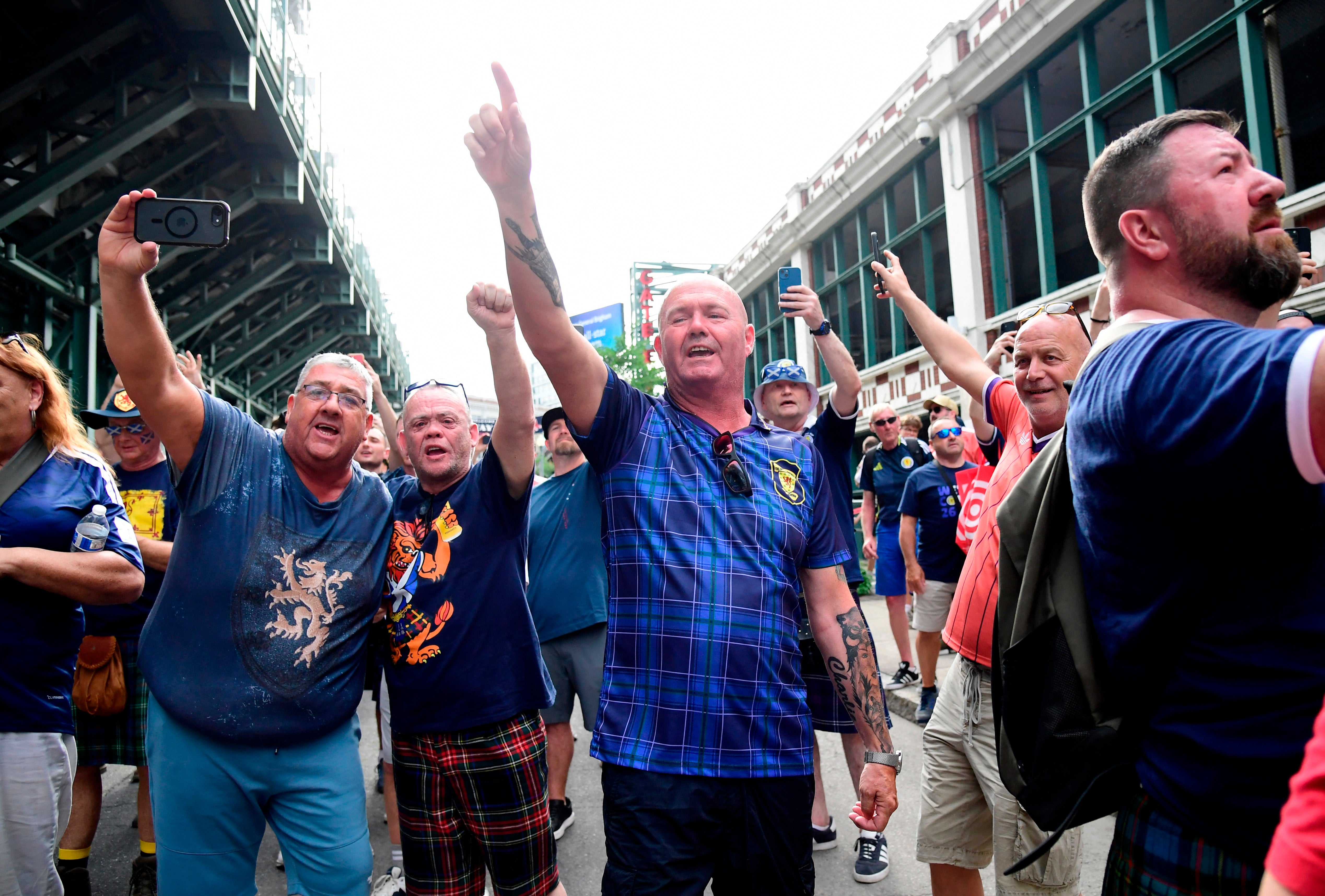Scotland's Tartan Army march to Boston's Fenway Park baseball stadium.