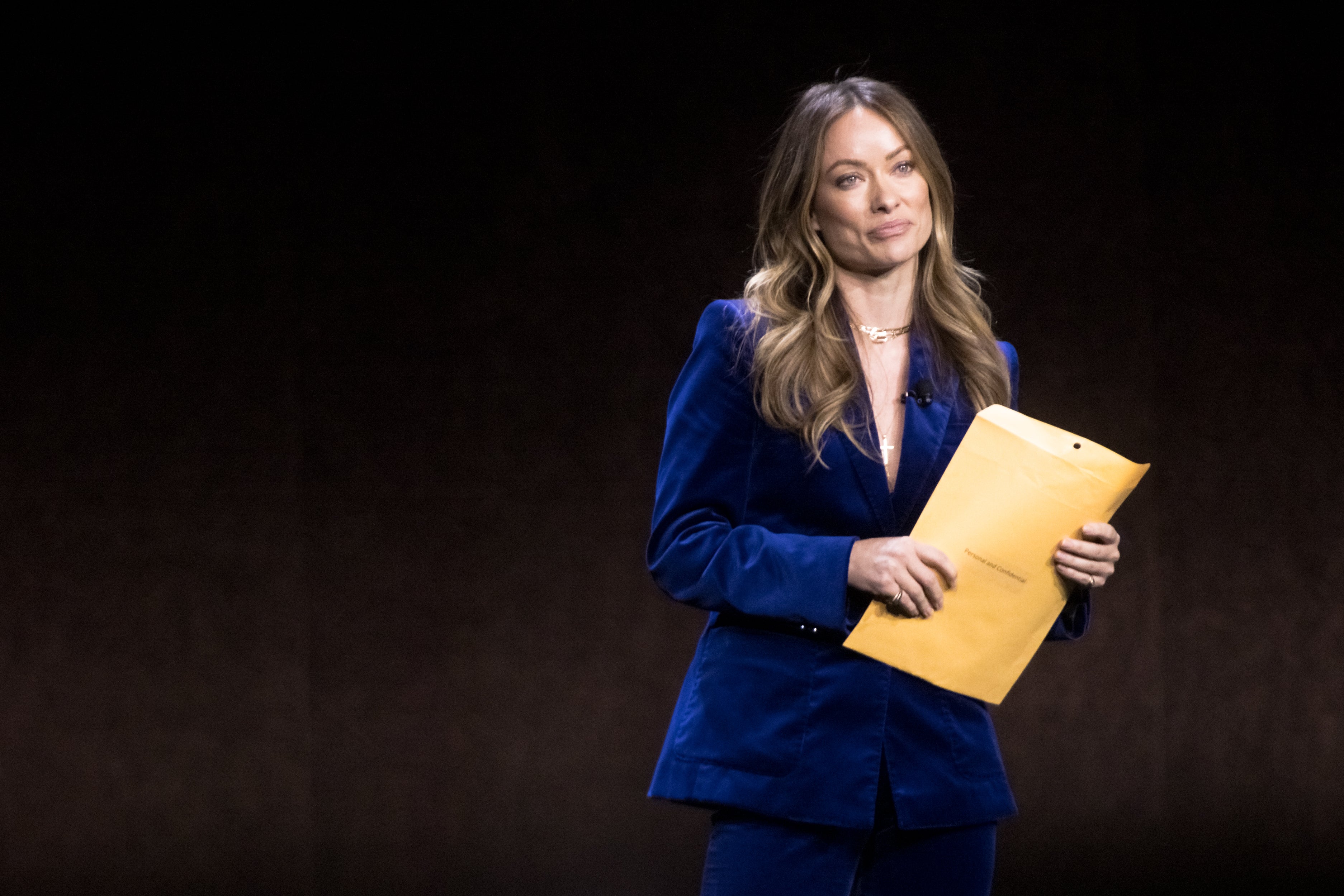 Olivia Wilde received the custody papers during her onstage presentation at CinemaCon in 2022 (Getty Images)