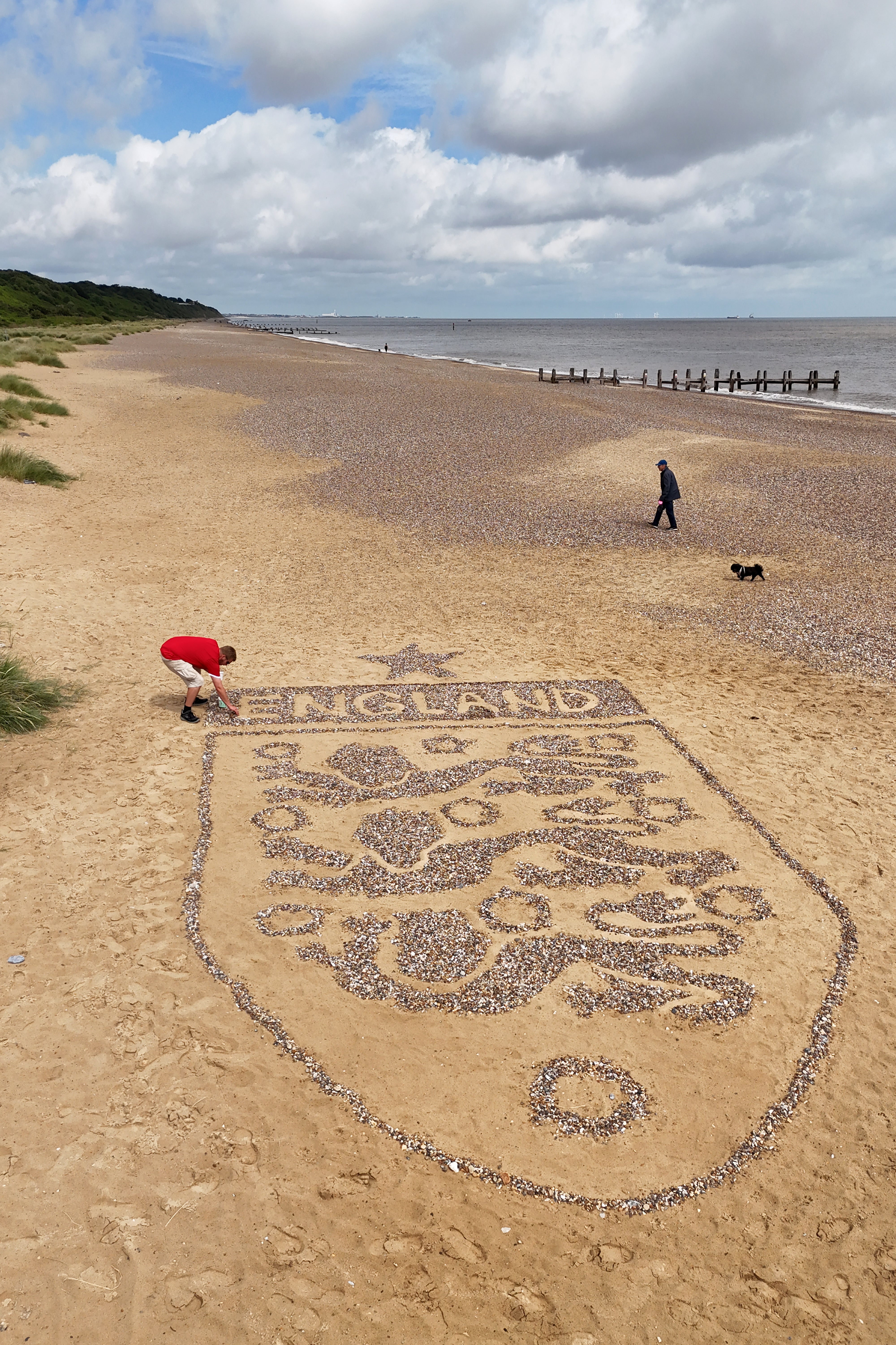The giant England badge was made by artist Toby Clark near Lowestoft, Suffolk (Joe Giddens/PA) (PA Wire)