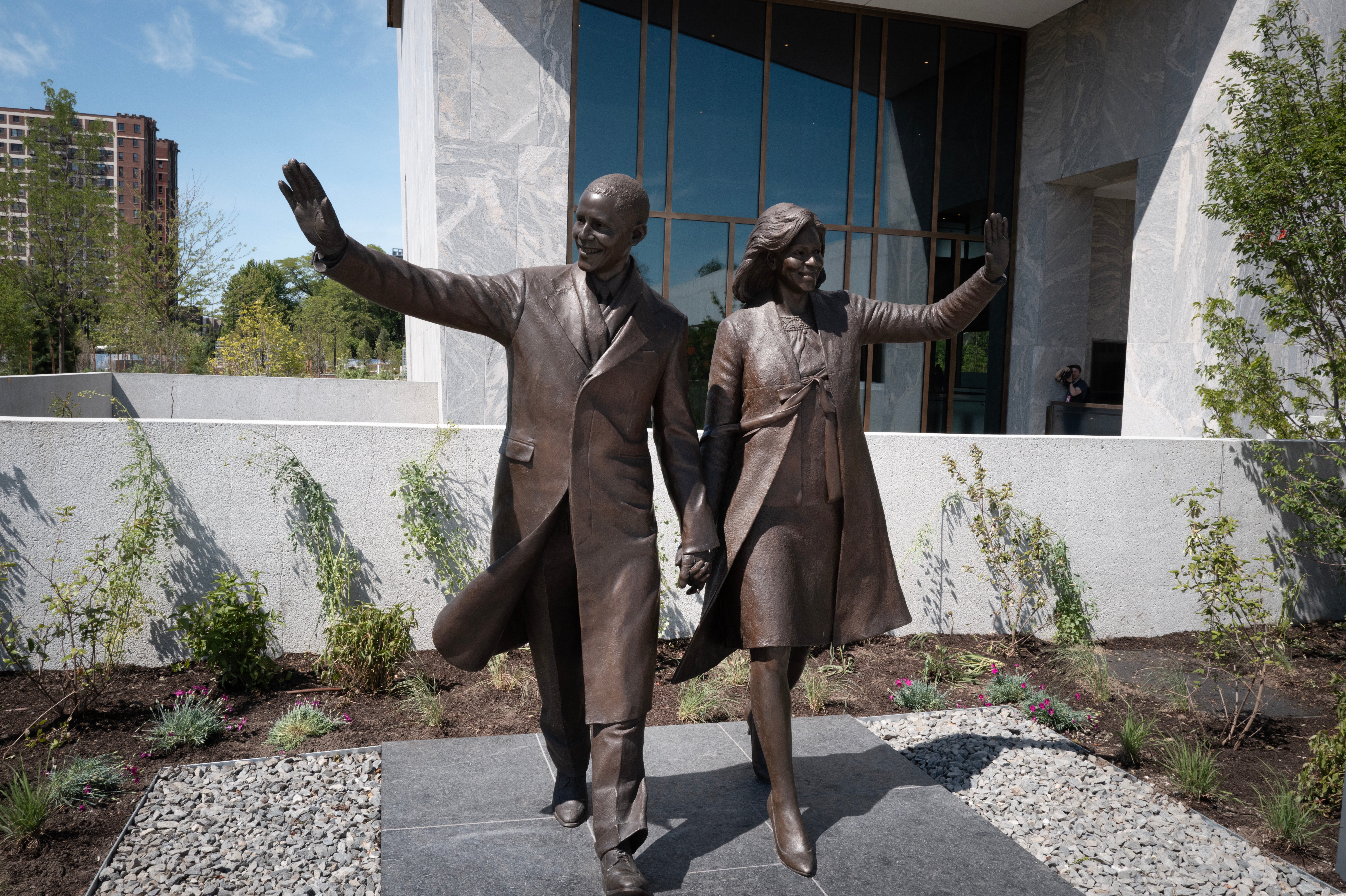 A statue depicting former President Barack Obama and first lady Michelle Obama sits on the campus of the Obama Presidential Center in Chicago (Getty)