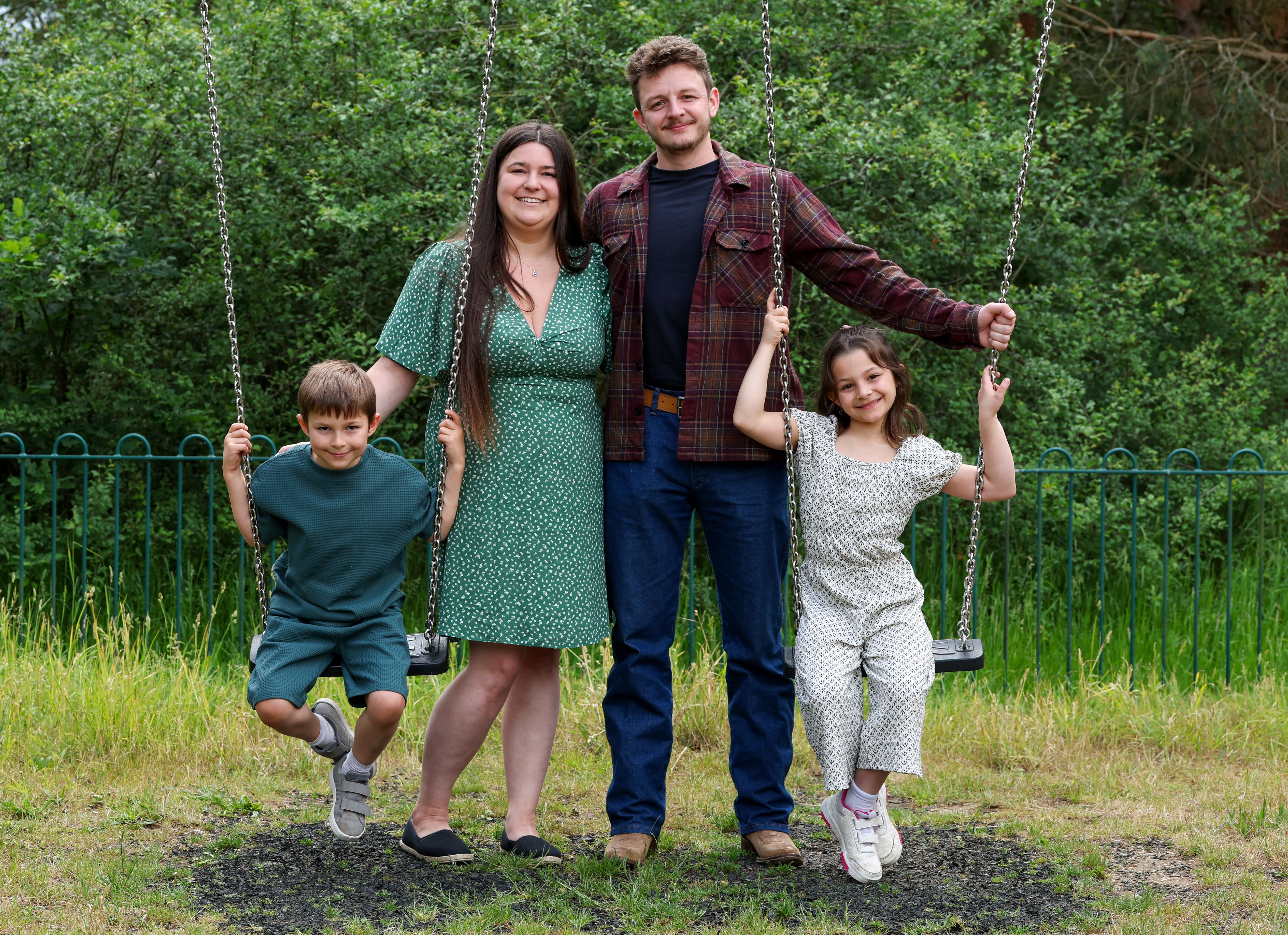 Tom Atkins and Amy Govier with their children Elliot, seven, and Miya, nine