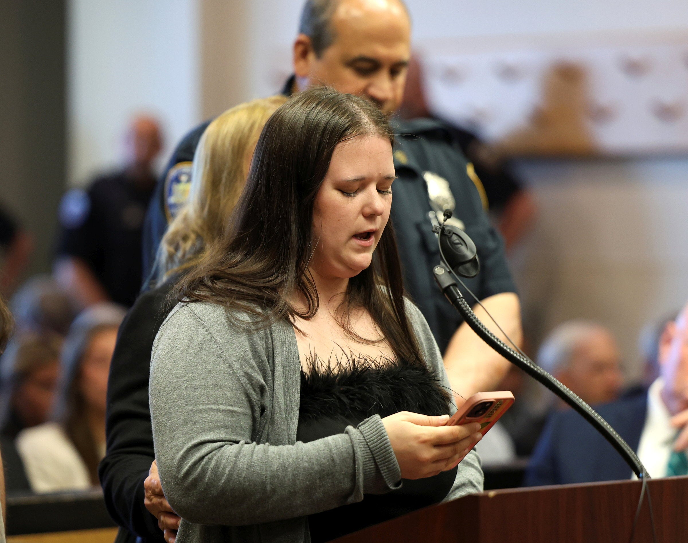 Nicolette Brainard-Barnes, daughter of Maureen Brainard Barnes, speaks in court (Getty)