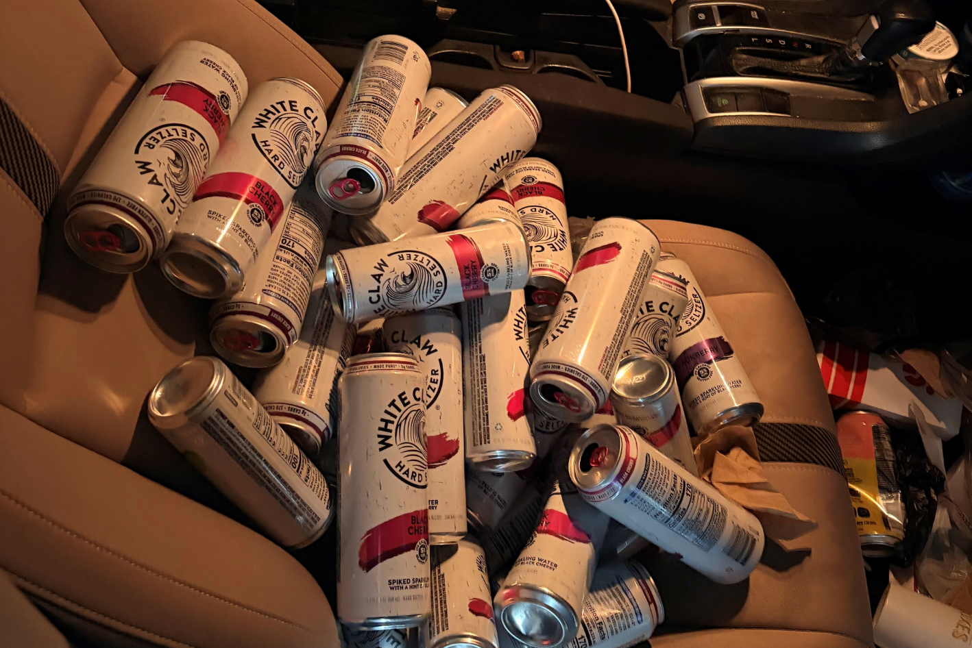 The dozens of White Claw hard seltzer cans can be seen piled atop each other in a photo posted  to FHP Tampa’s Instagram page (Florida Highway Patrol / Instagram)