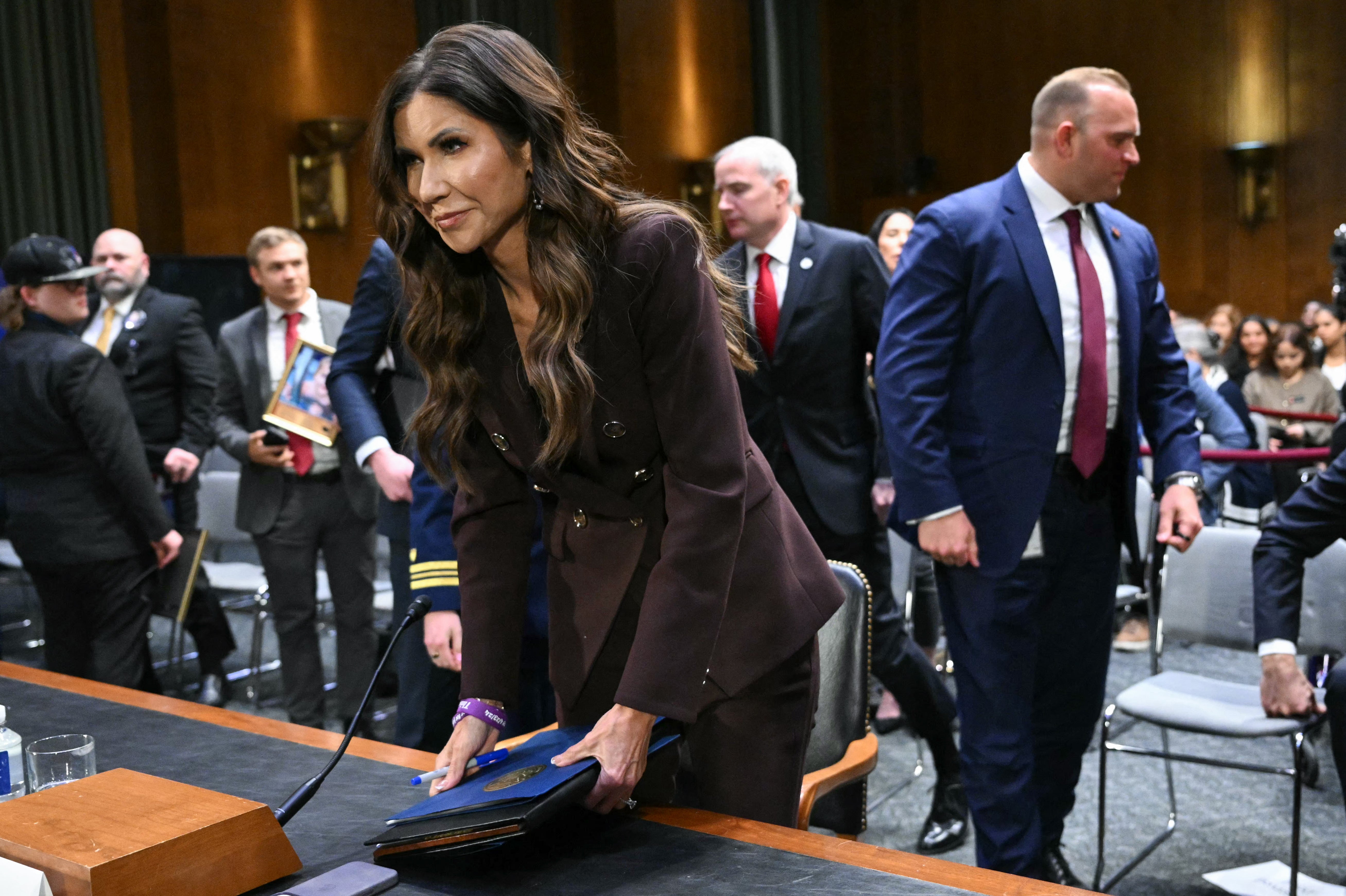 On March 4, Noem testified before Congress on her tenure at DHS, where she faced questions on her handling of ICE and her use of taxpayer dollars. She was fired by Trump the next day (AFP via Getty Images)