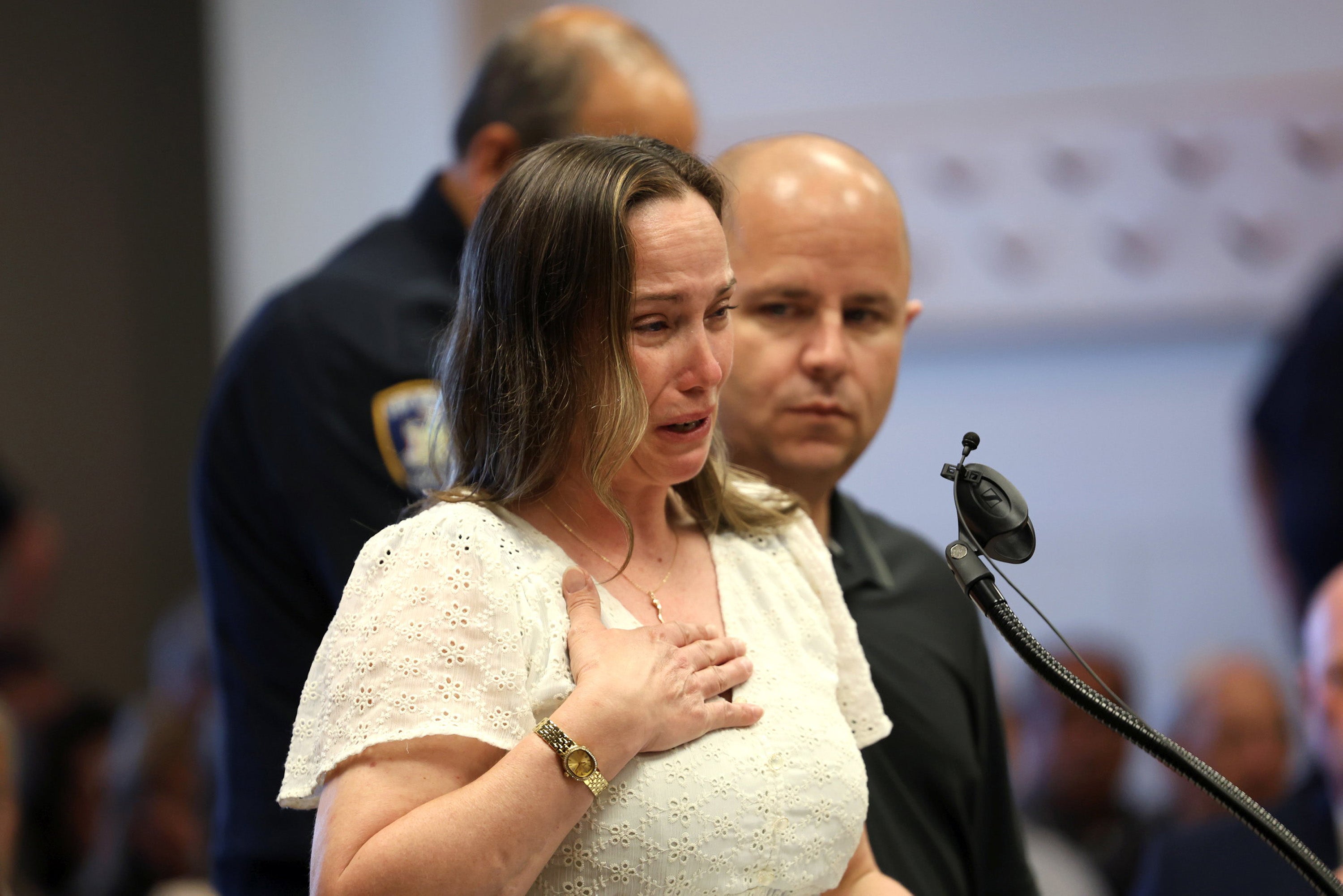 Melissa Cann, sister of Maureen Brainard-Barnes, speaks through her tears in court (Getty)