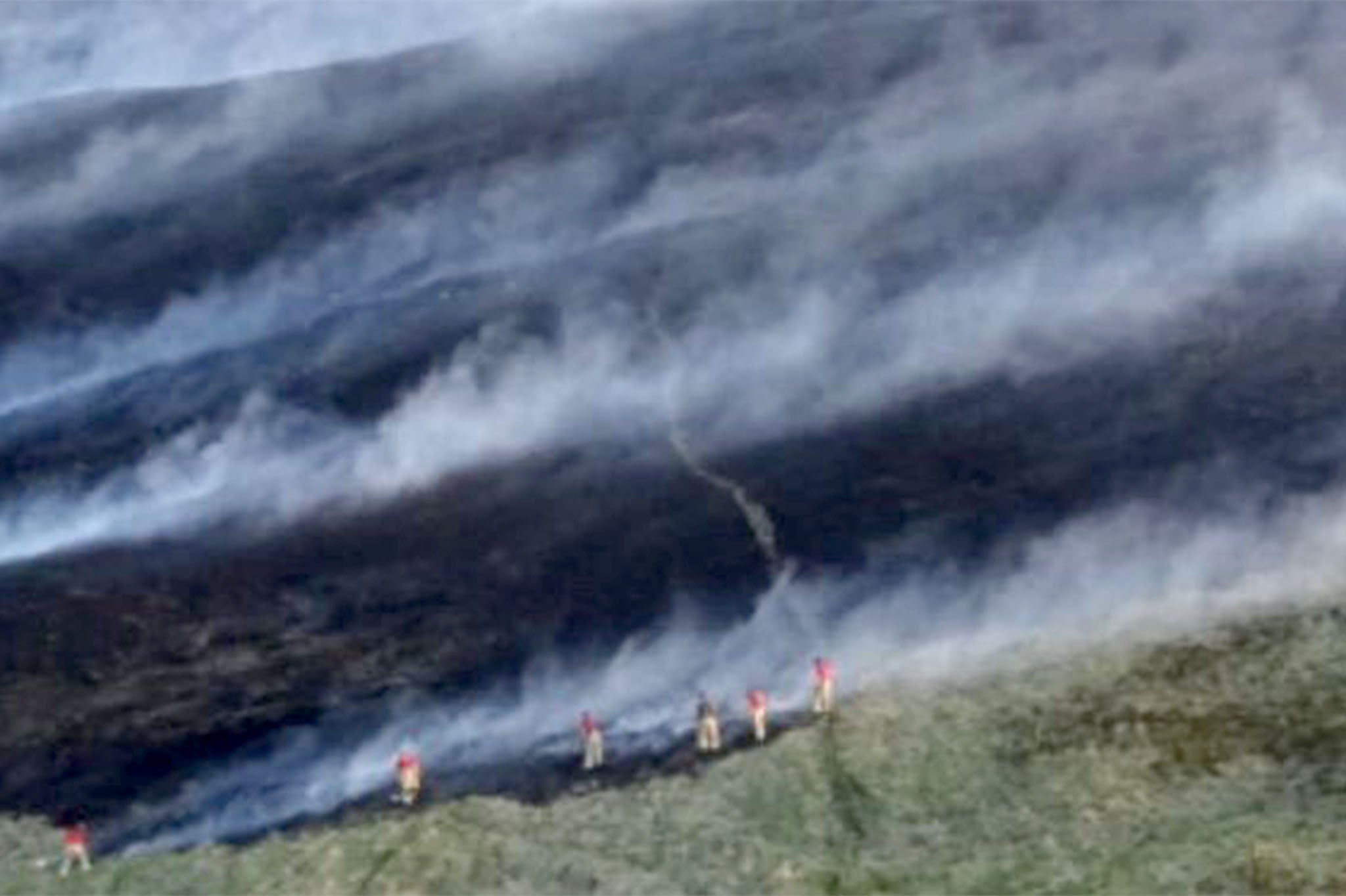 Lancashire Fire and Rescue Service crew fighting the fire on Darwen Moor in March 2020