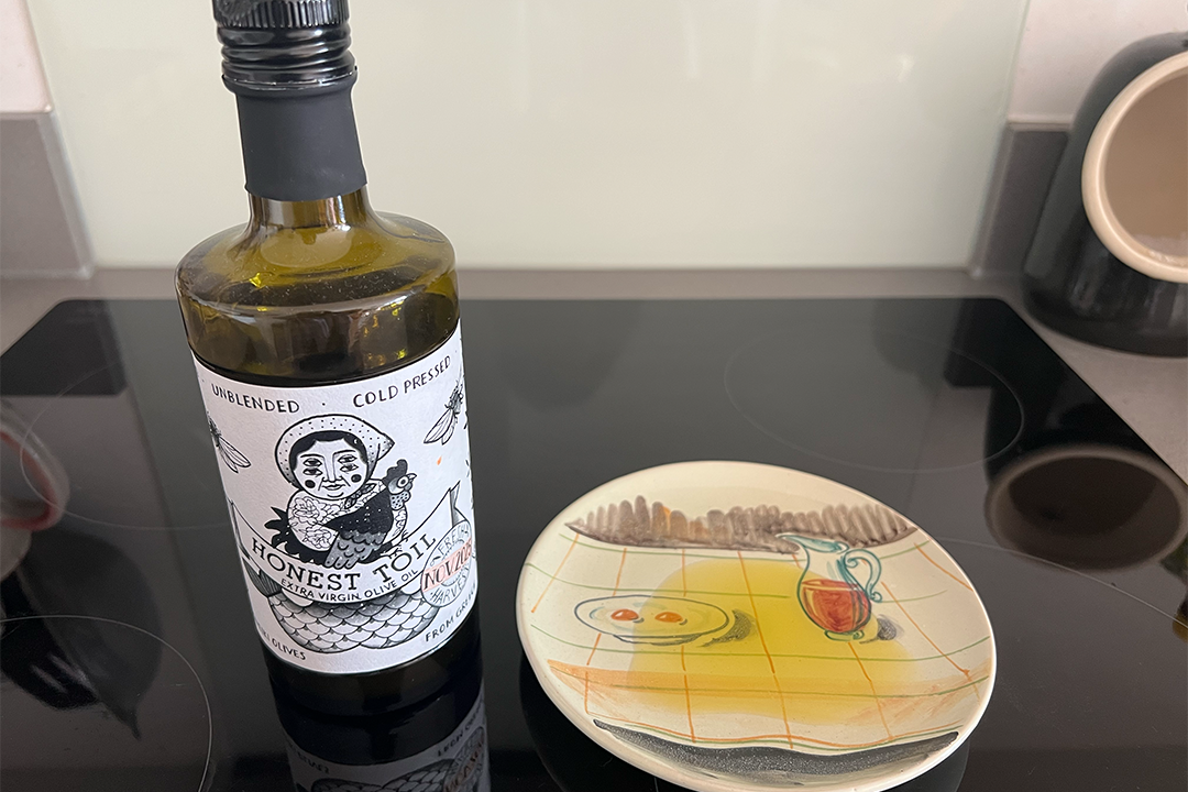 This raw, unfiltered olive oil is slightly opaque due to sediment from the olive skins and pips (Kate Ng/The Independent)