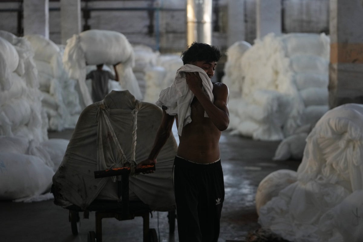 Climate-driven heat in India’s textile factories stifles workers but coolers and ventilation help