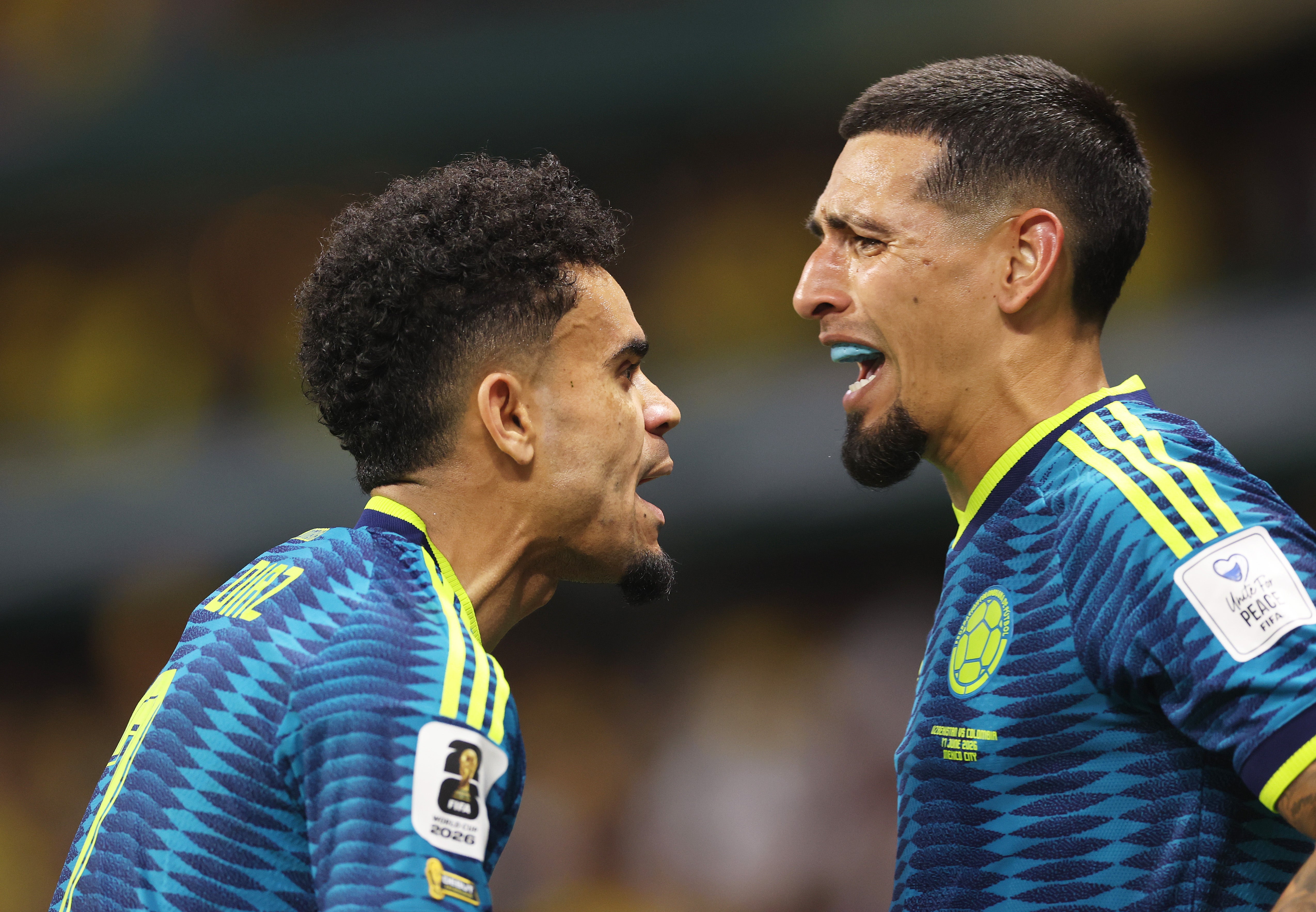 Daniel Munoz of Colombia celebrates with teammate Luis Diaz