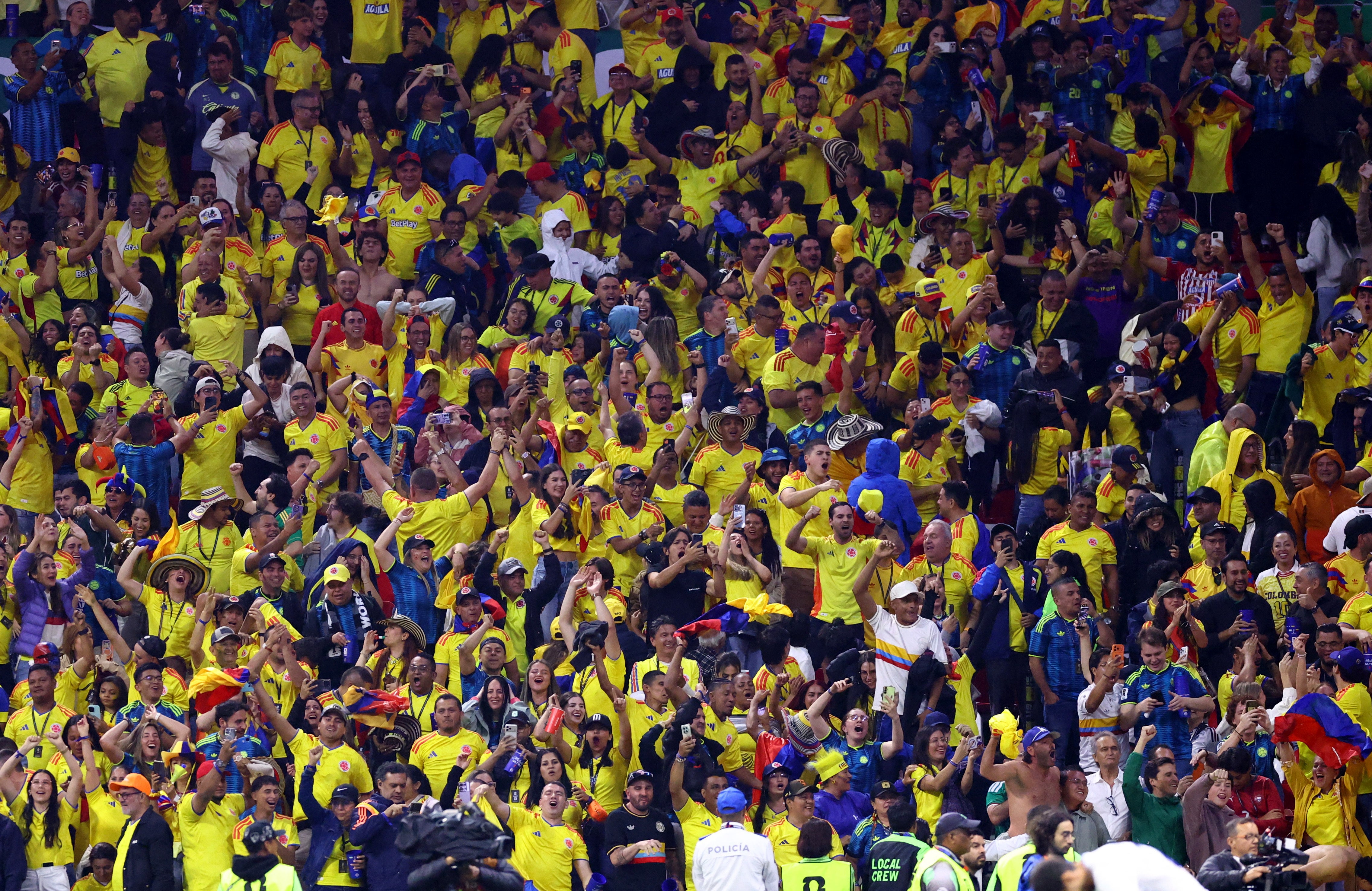 Colombia fans celebrate after the match (Reuters)