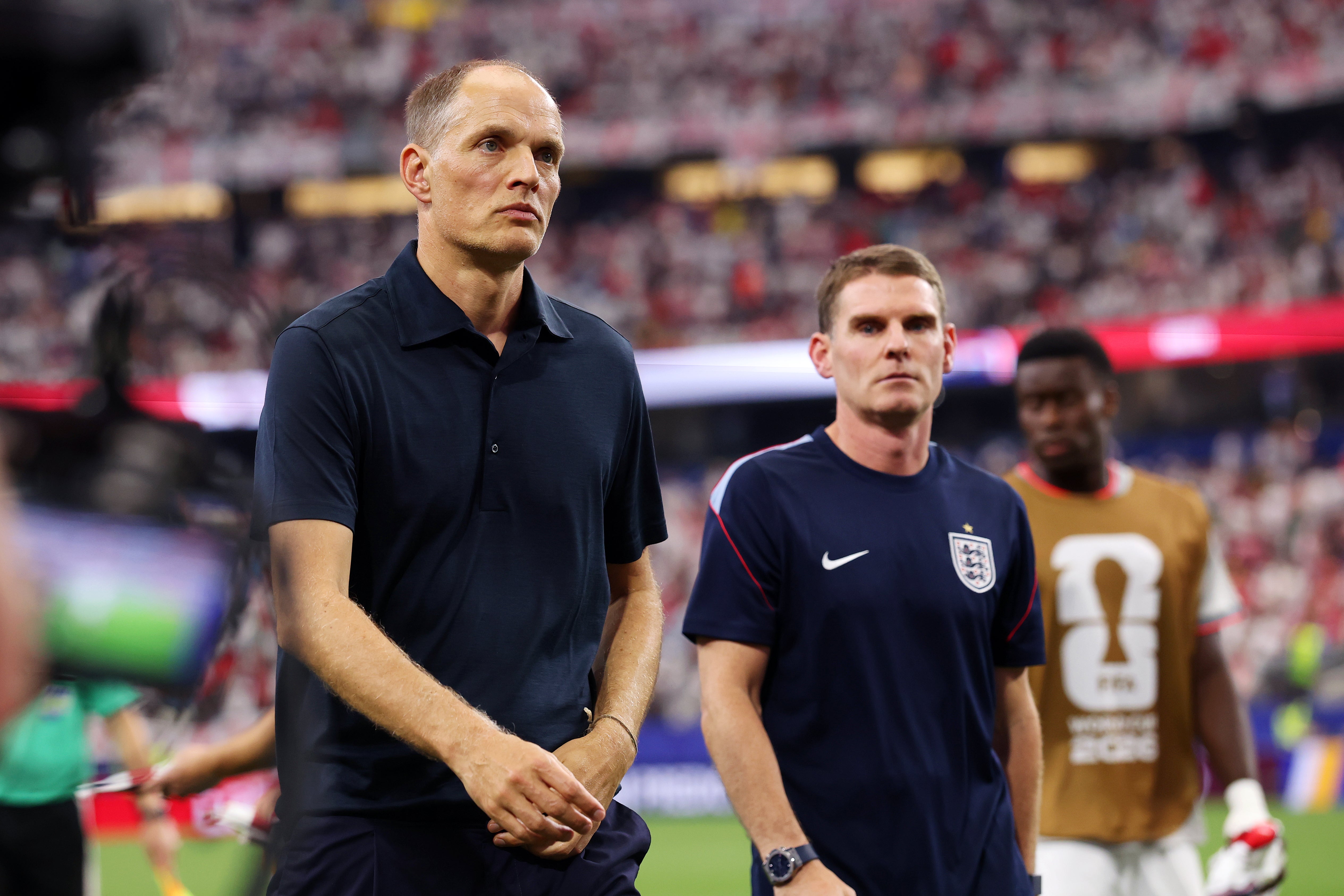 Tuchel and his assistant Anthony Barry leave the field