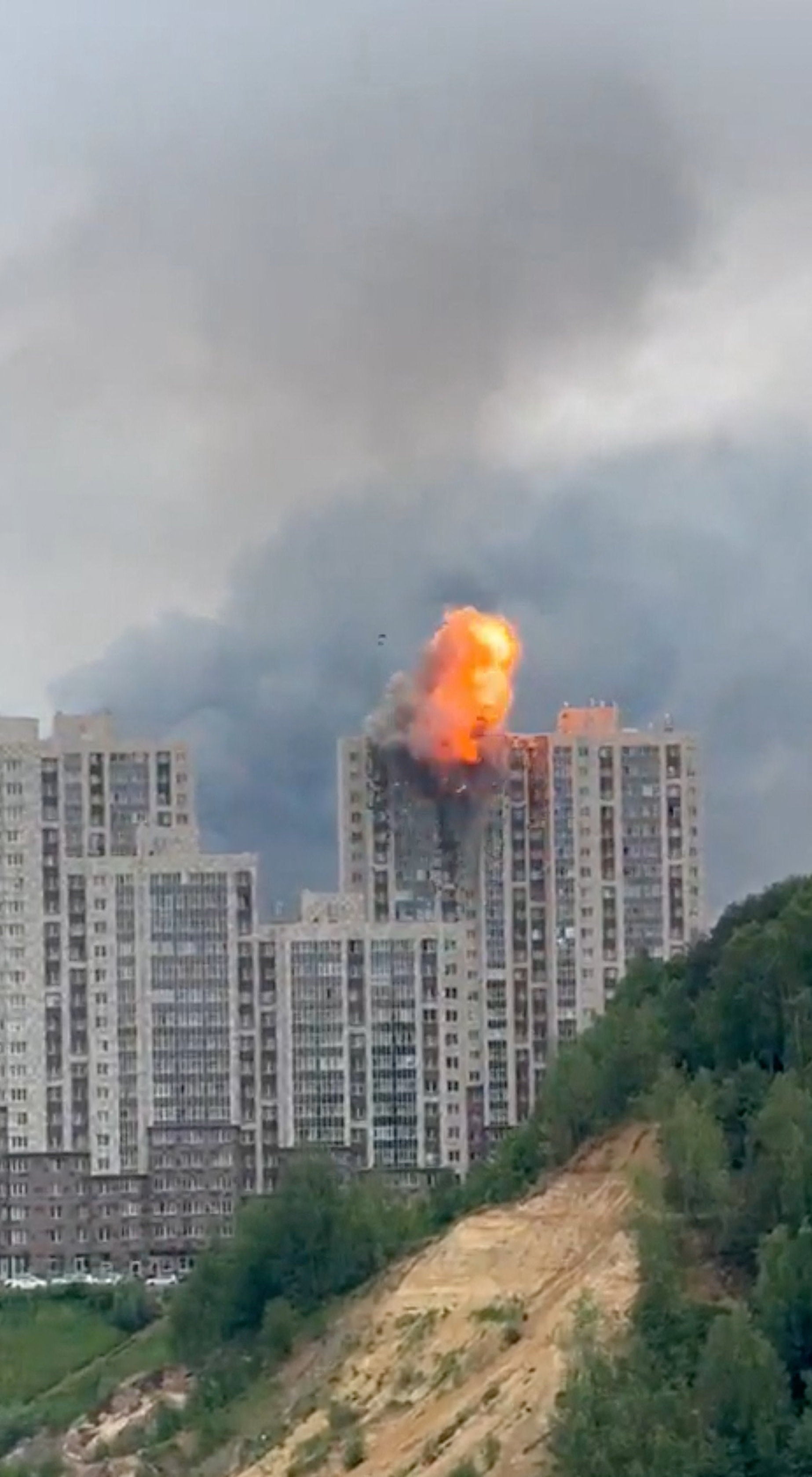 Fire and smoke rise from a building following a Ukrainian drone attack in Moscow (Social media)