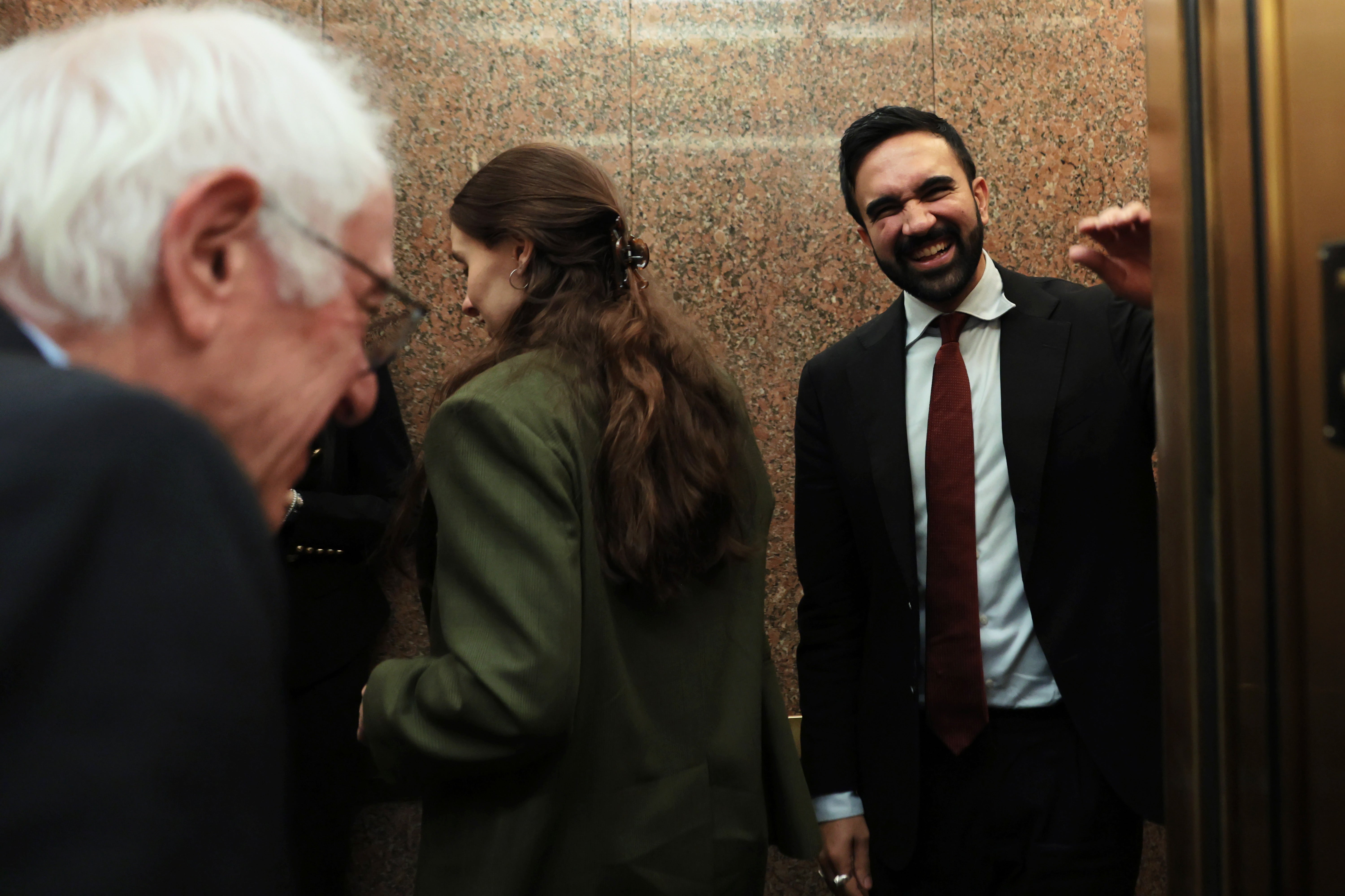 Sen. Bernie Sanders (I-VT) and NYC Mayoral Candidate Zohran Mamdani enter an elevator after a meeting in the Dirksen Senate Office Building