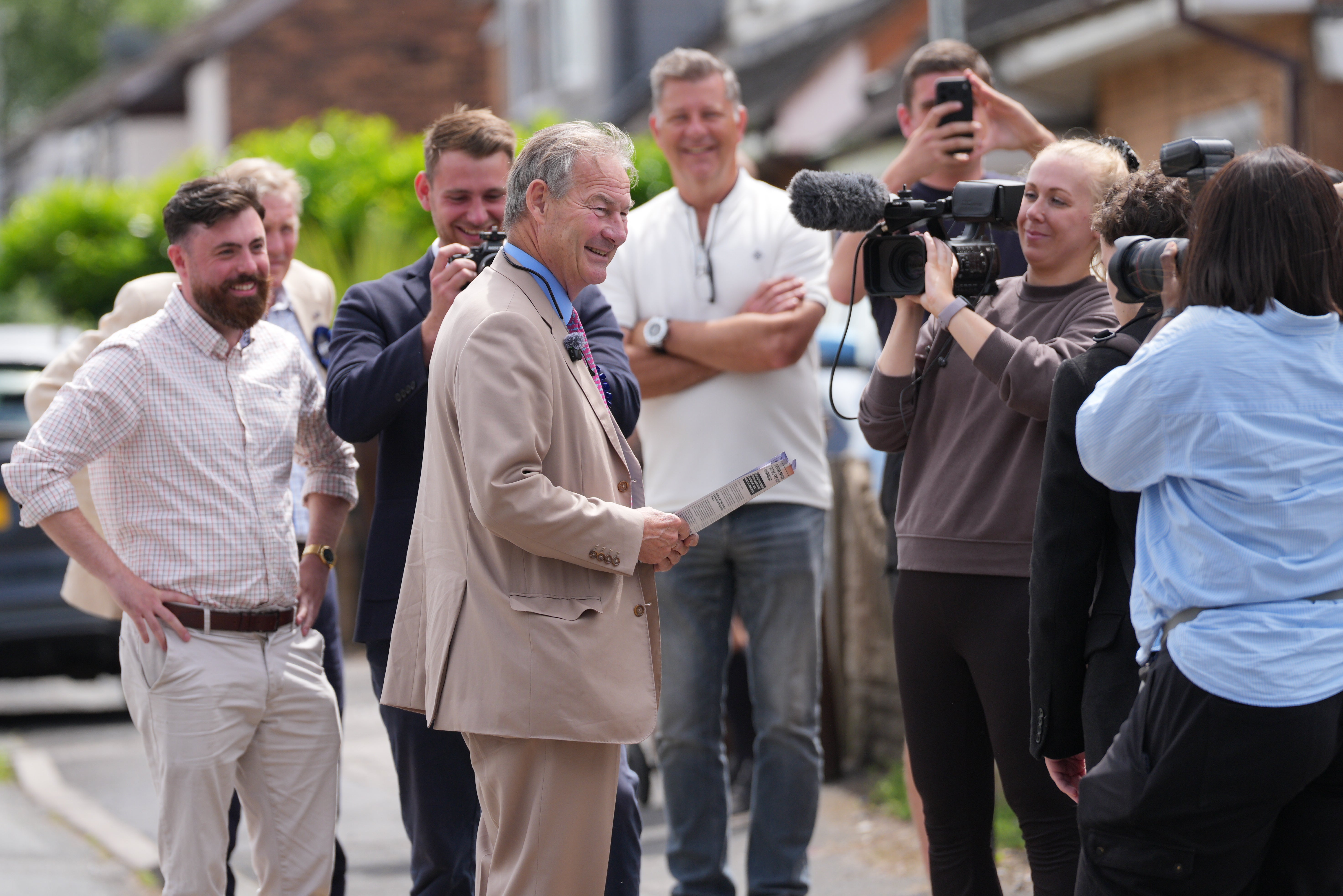 Leader of Restore Britain, Rupert Lowe, speaks to media opposite Labour campaign HQ (Getty)