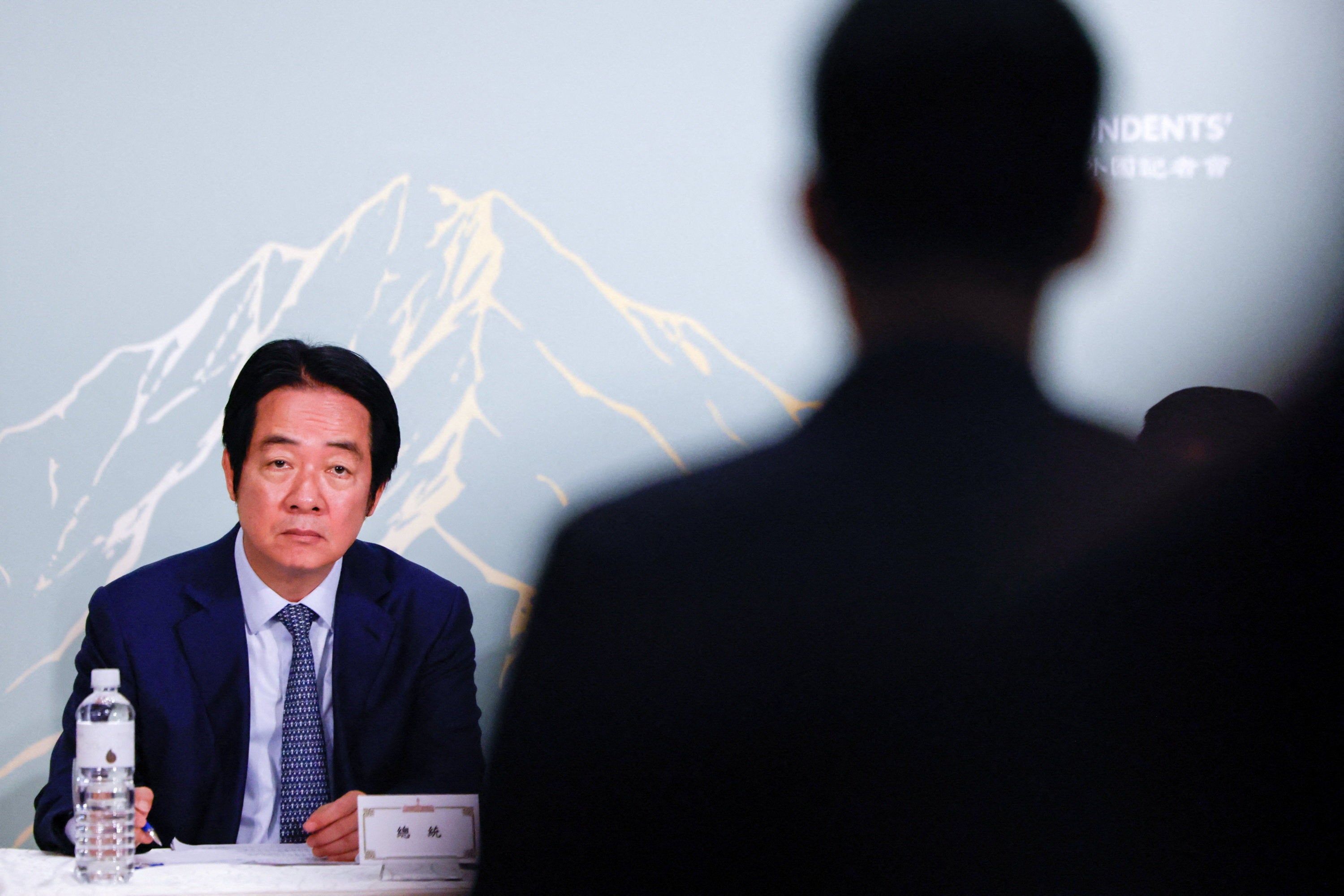 Taiwan President Lai Ching-te takes notes as a reporter asks a question during a press conference with the Taiwan Foreign Correspondents’ Club in Taipei, Taiwan, June 18