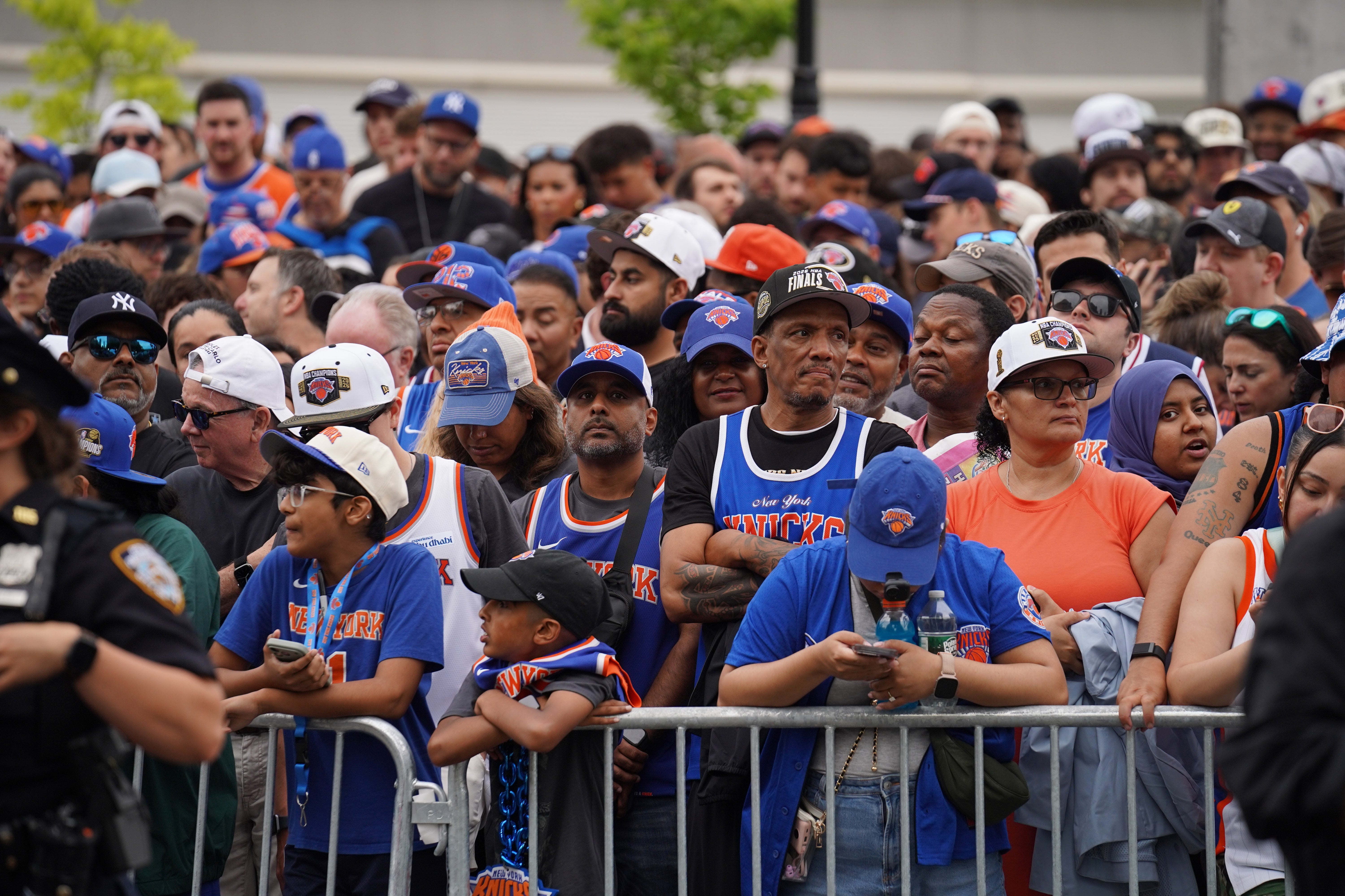 Fans line up along the route before the New York Knicks' NBA championship parade