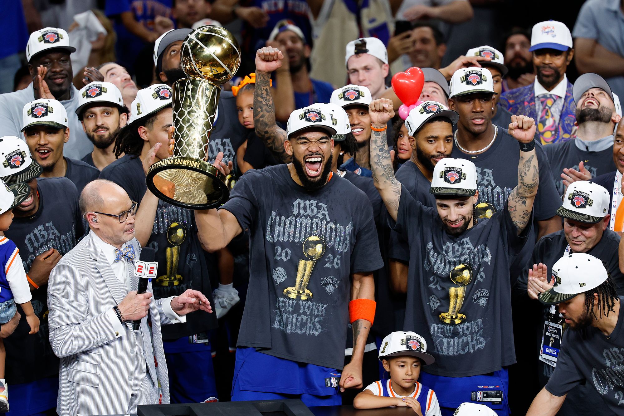 The New York Knicks celebrates with the Larry O'Brien Championship Trophy after their victory against the San Antonio Spurs in Game Five of the 2026 NBA Finals