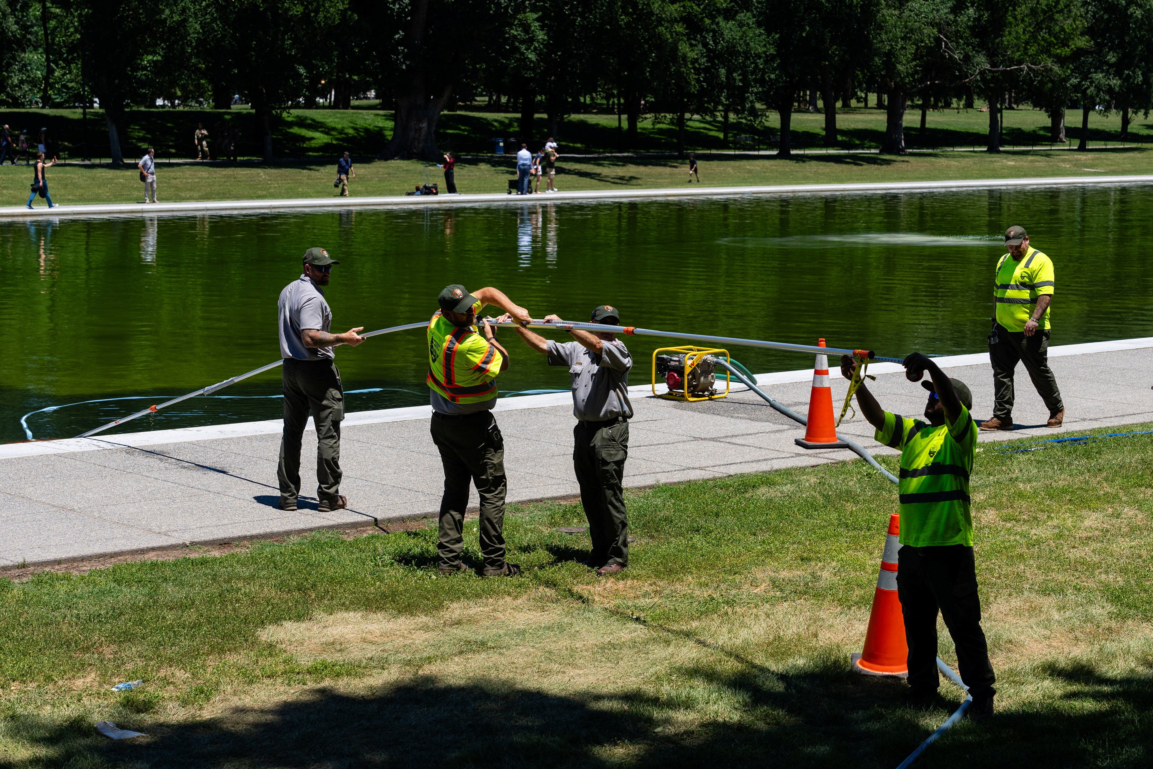 President Donald Trump’s $14 million pet project to resurface the 2,000-foot pool, which was supposed to make the water appear an ‘American flag blue,’ has turned green after becoming infested with algae just days after completion (Reuters)