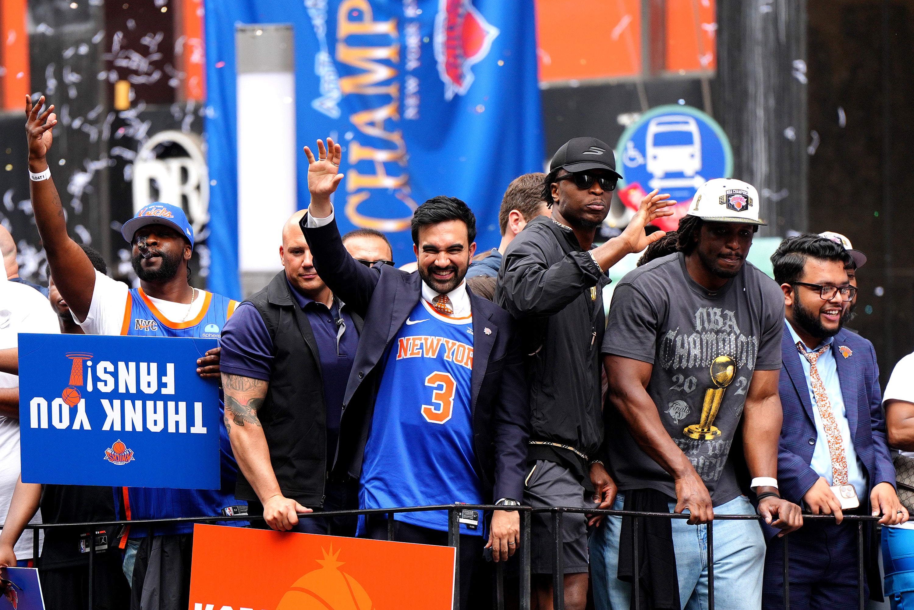 New York City Mayor Zohran Mamdani and OG Anunoby of the New York Knicks celebrate on a float