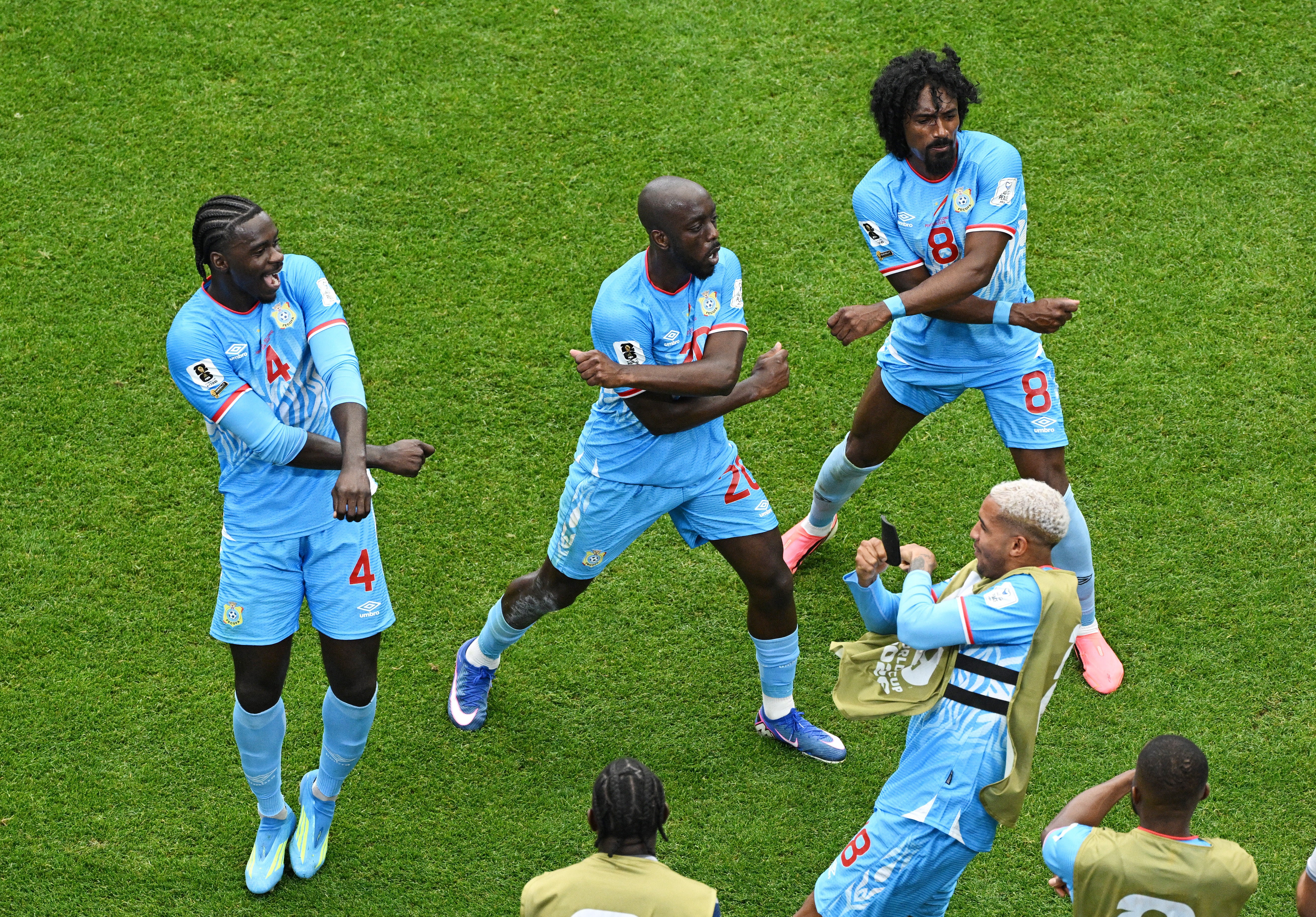 DR Congo players celebrate Yoane Wissa's equaliser against Portugal