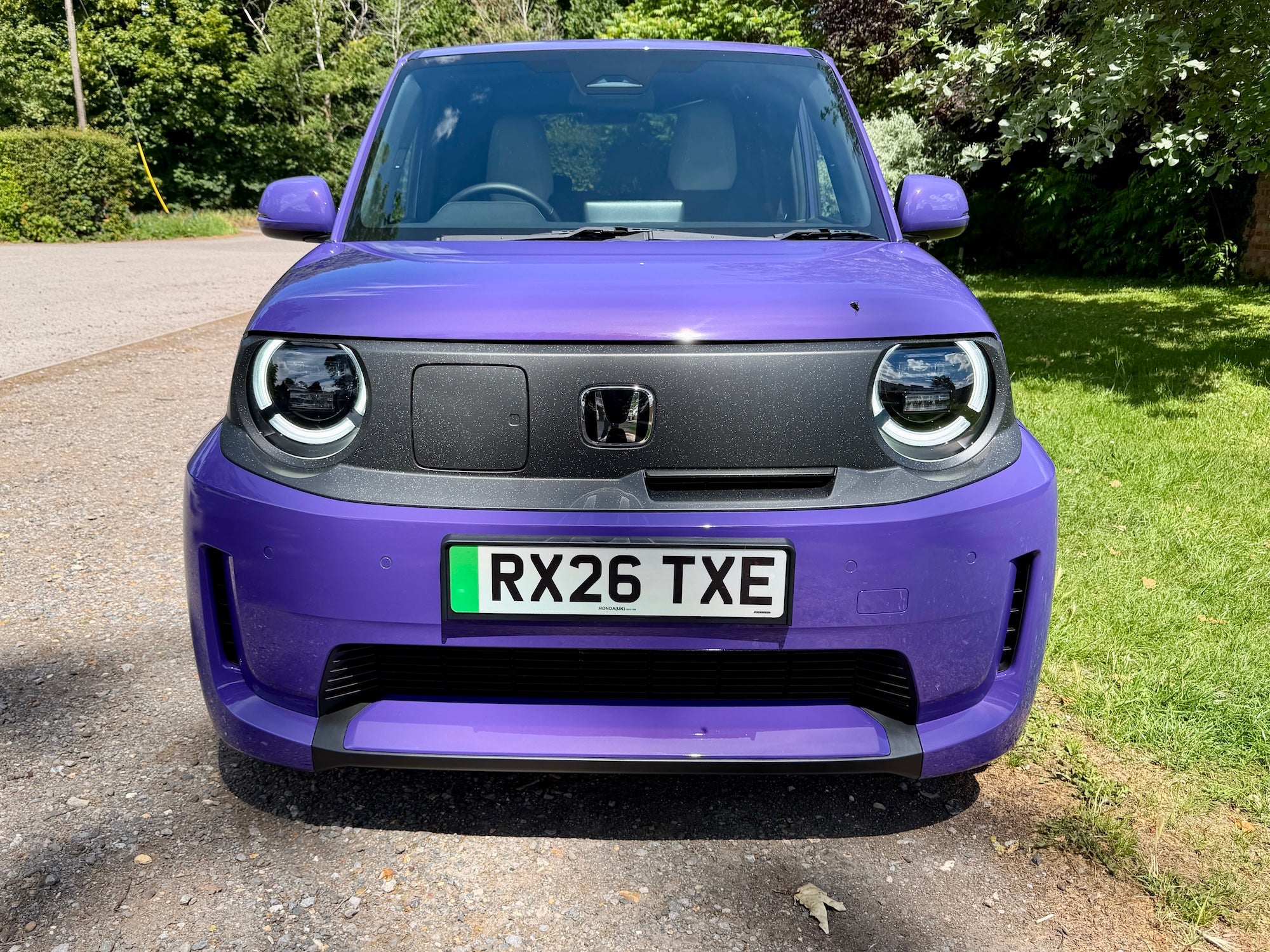 The Honda Super-N looks the part with its body kit and circular LED lights