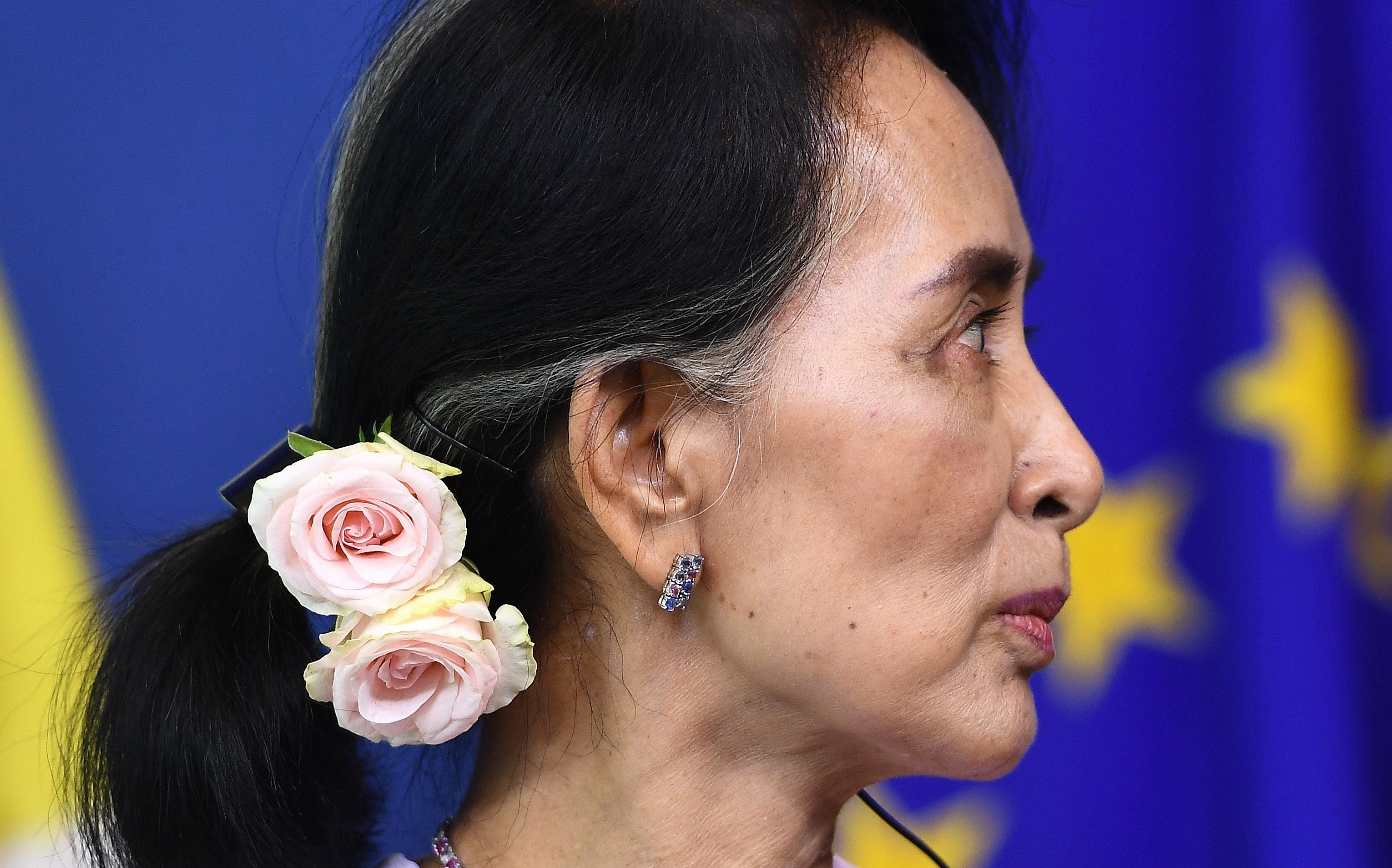 Aung San Suu Kyi, wearing roses in her hair in 2017, used to wear the flower regularly