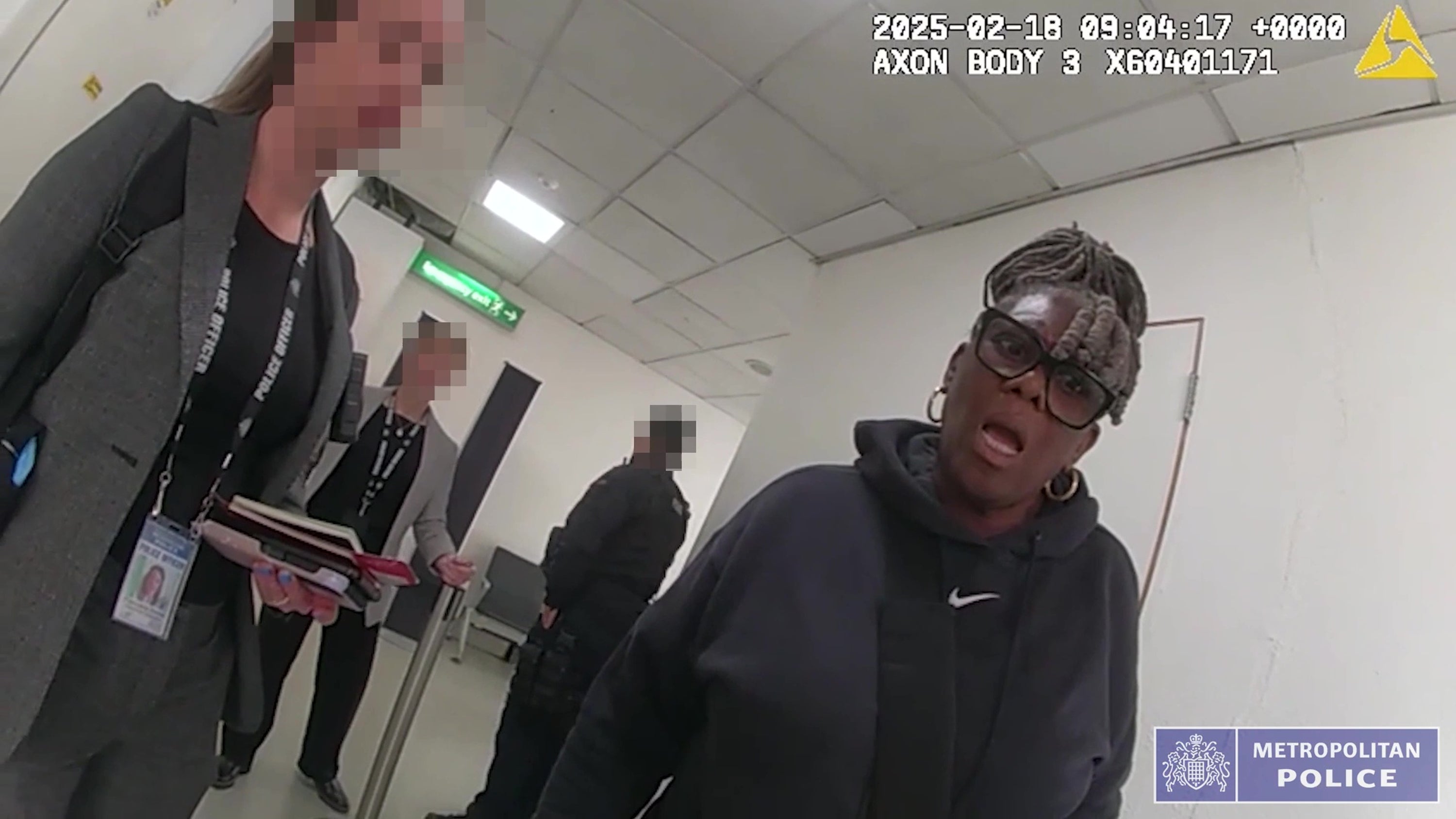 Janice Nix being arrested at Heathrow Airport, London.