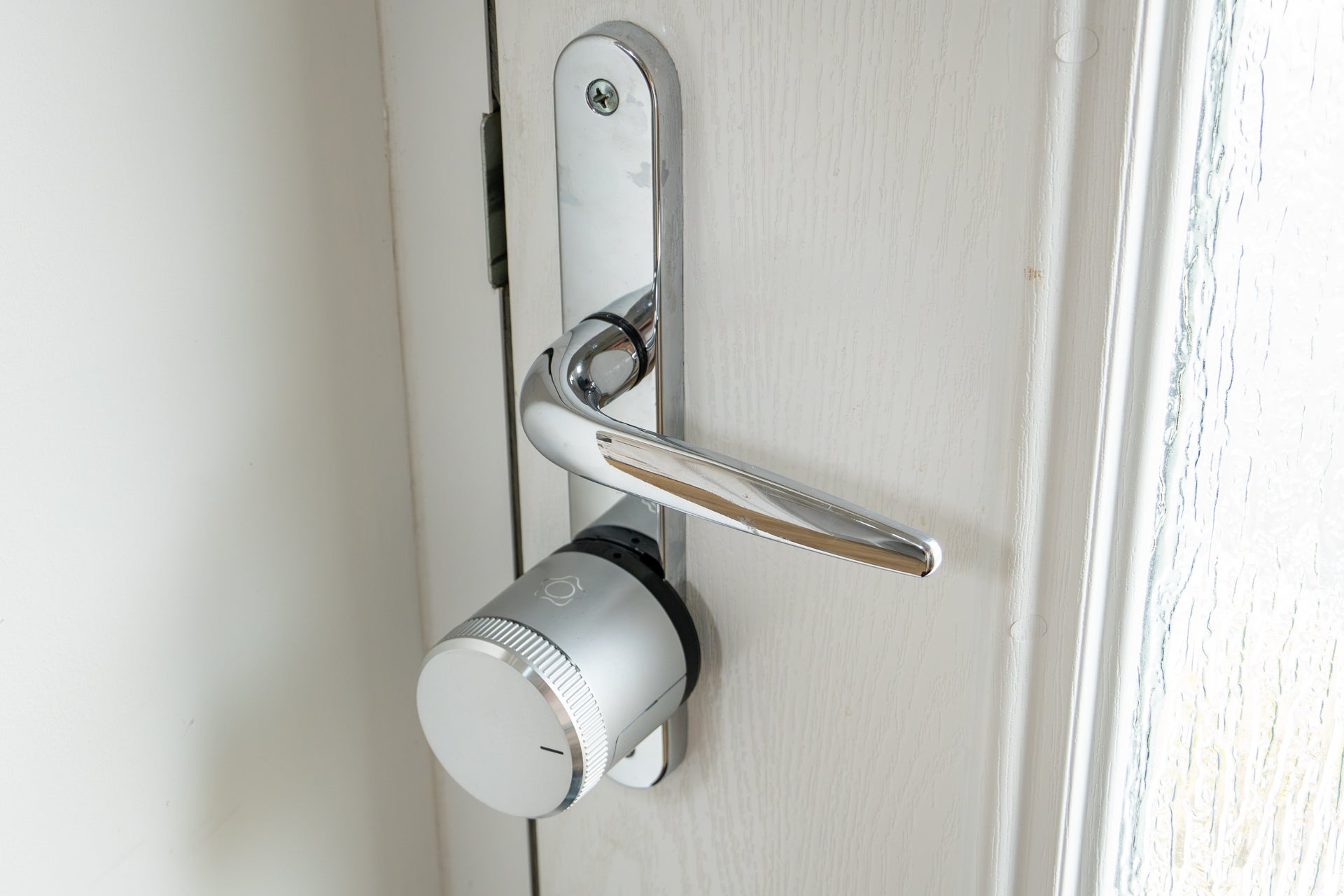 Verisure also offers an optional motorised door lock with its alarm system (Alistair Charlton / The Independent)